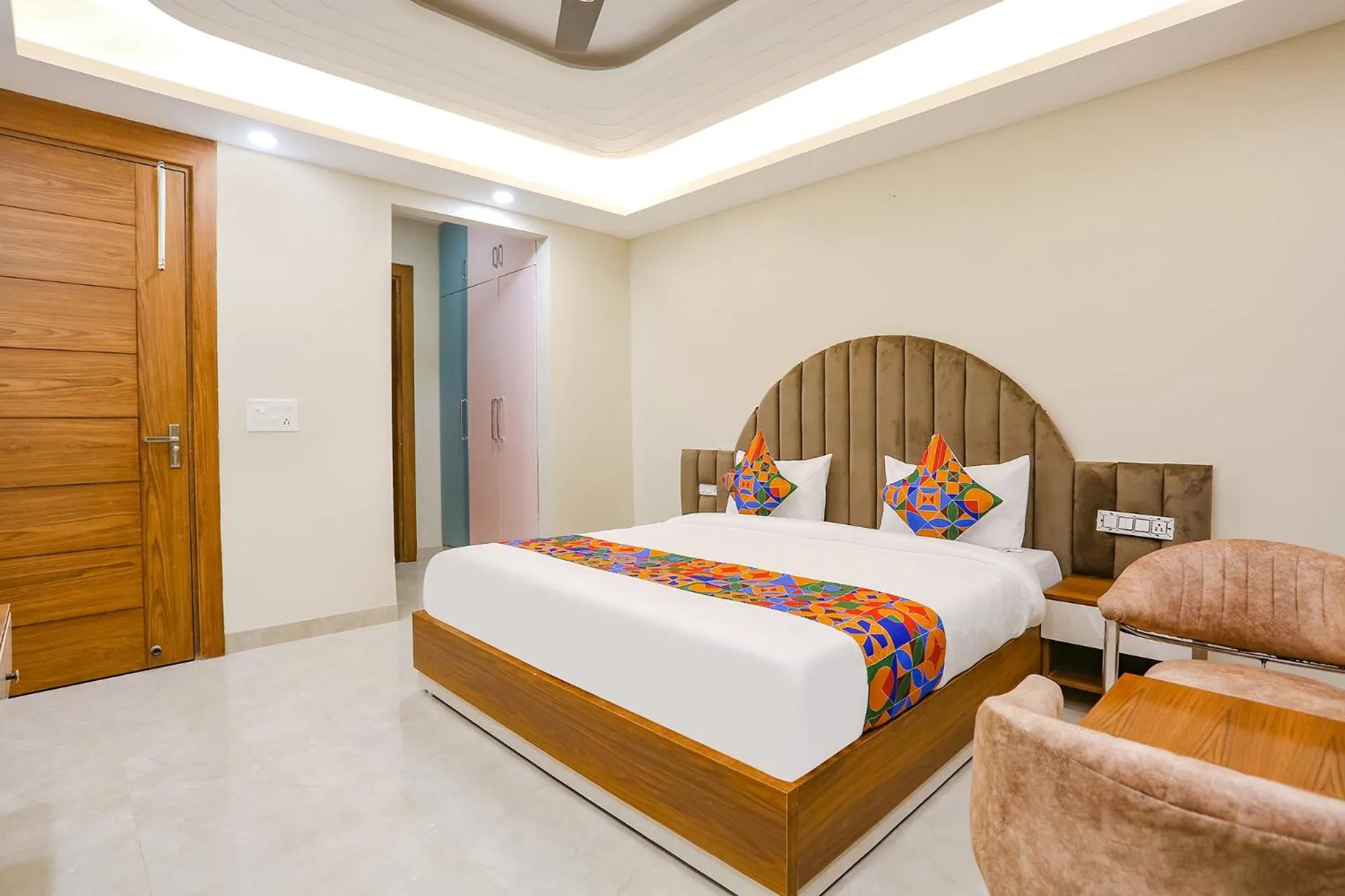Living room, Bed in FabHotel Raahi Retreat - Nr Star Mall & 32nd Avenue