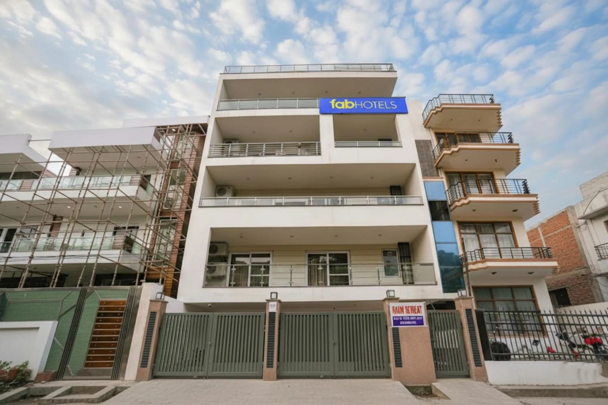 Property building in FabHotel Raahi Retreat - Nr Star Mall & 32nd Avenue