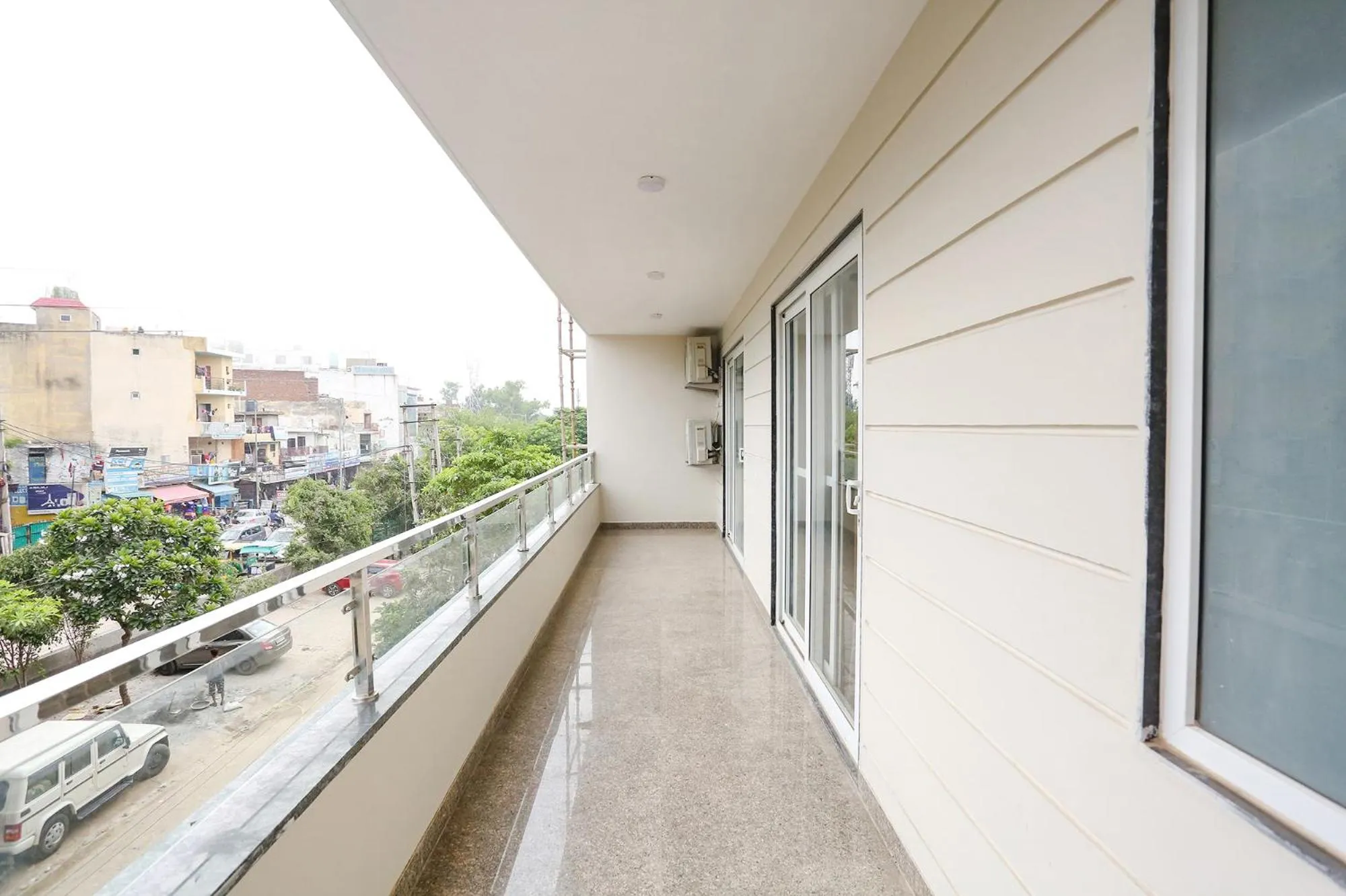 Balcony/Terrace in FabHotel Raahi Retreat - Nr Star Mall & 32nd Avenue