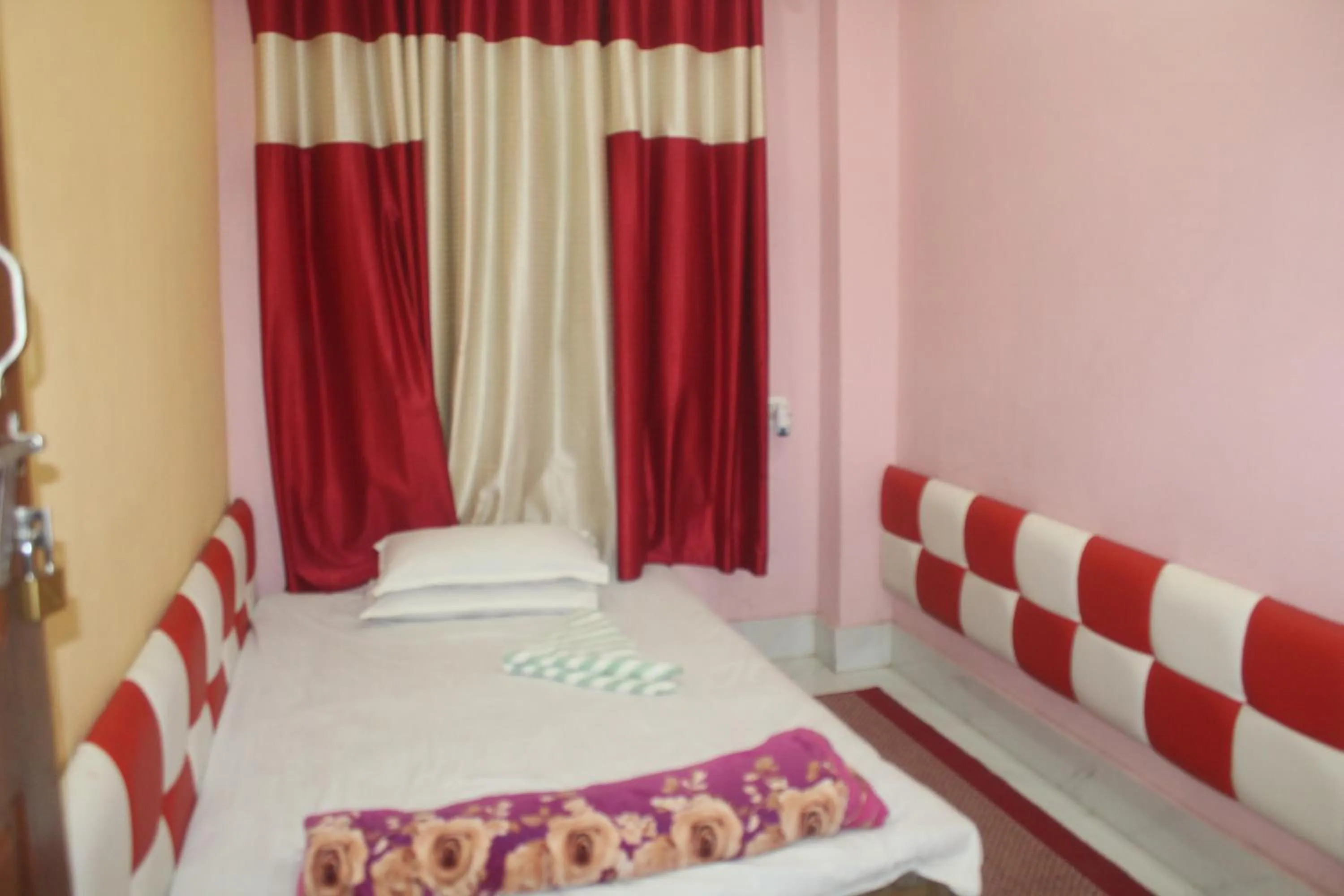 Bedroom in Hotel Giggle Coast Restro and Lodge