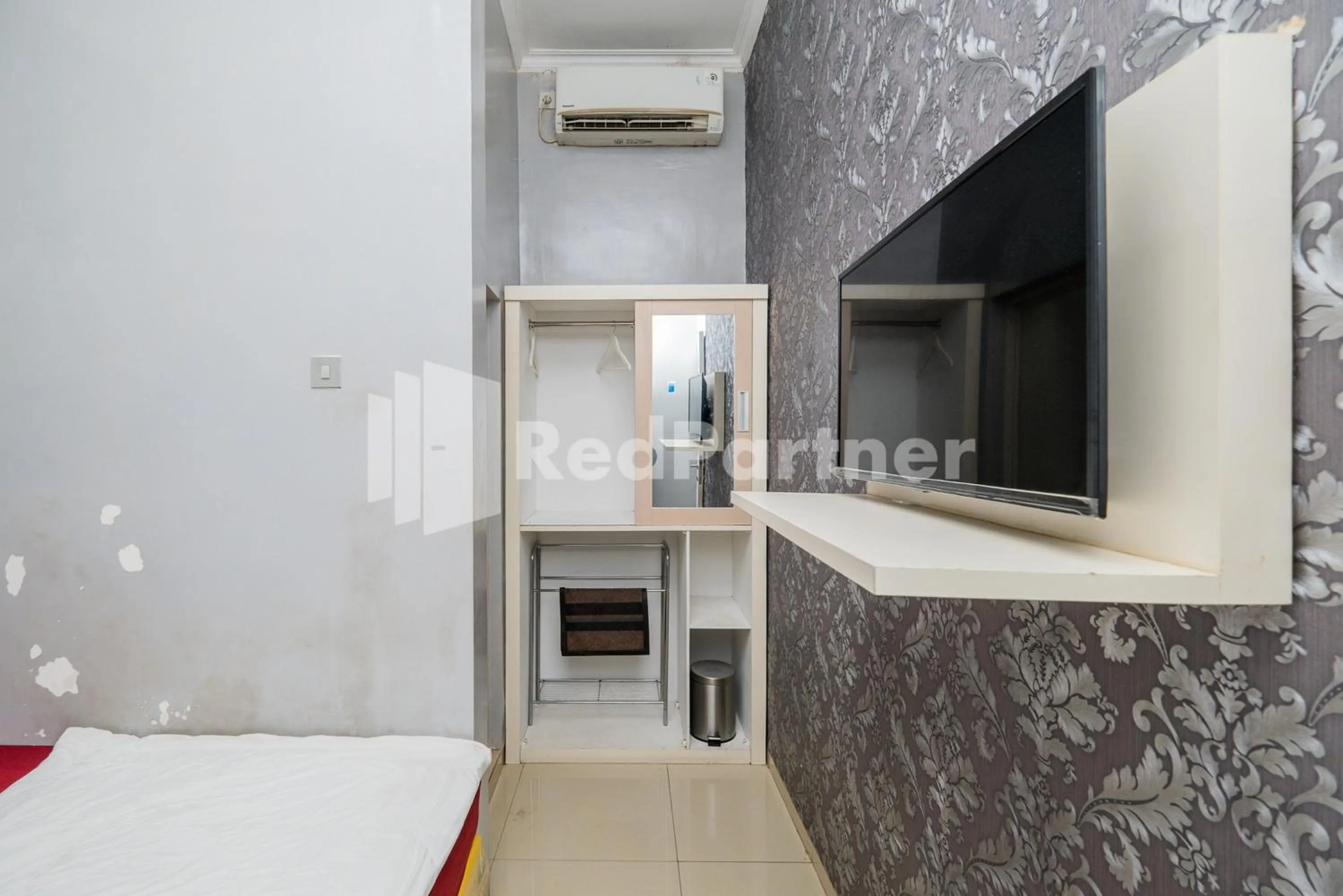 Bed in Omah Kalimosodo Mitra RedDoorz near Stasiun Malang Kota Baru