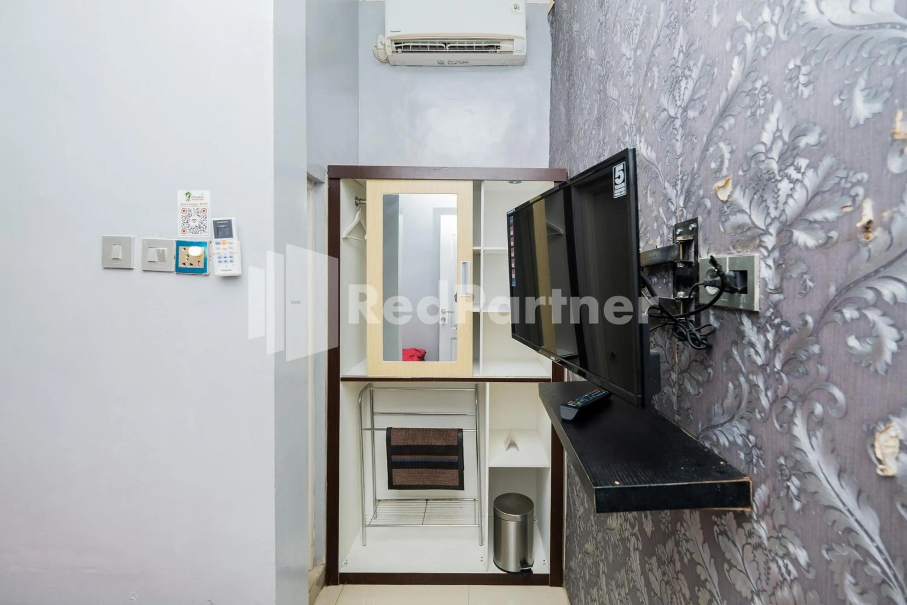 TV and multimedia in Omah Kalimosodo Mitra RedDoorz near Stasiun Malang Kota Baru