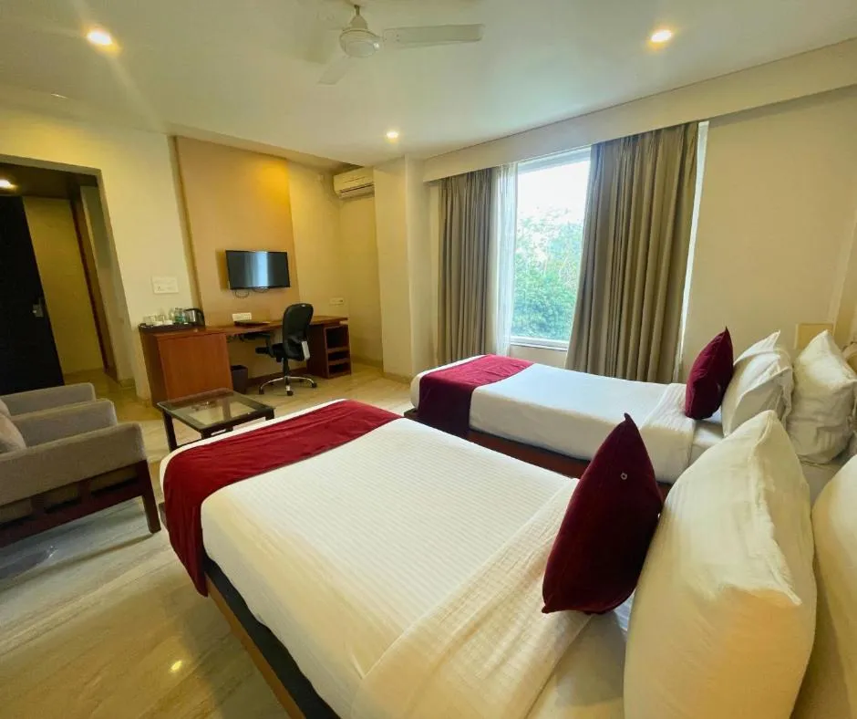 Communal lounge/ TV room in Prism - A Boutique Hotel