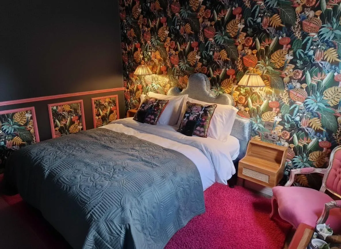 Bed in The Mad Hatter's Guestrooms