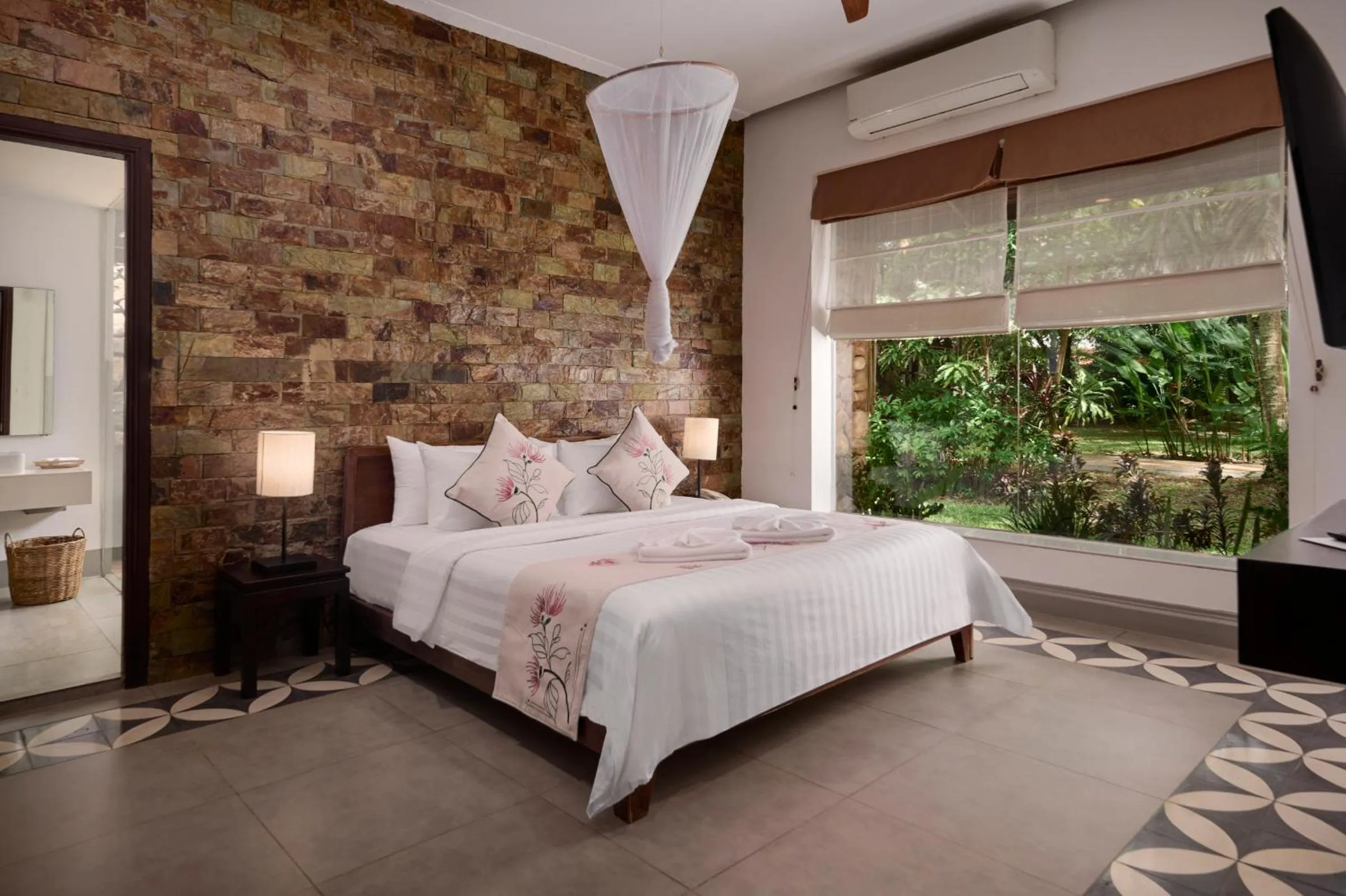 Bed in Samanea Beach Resort & Spa