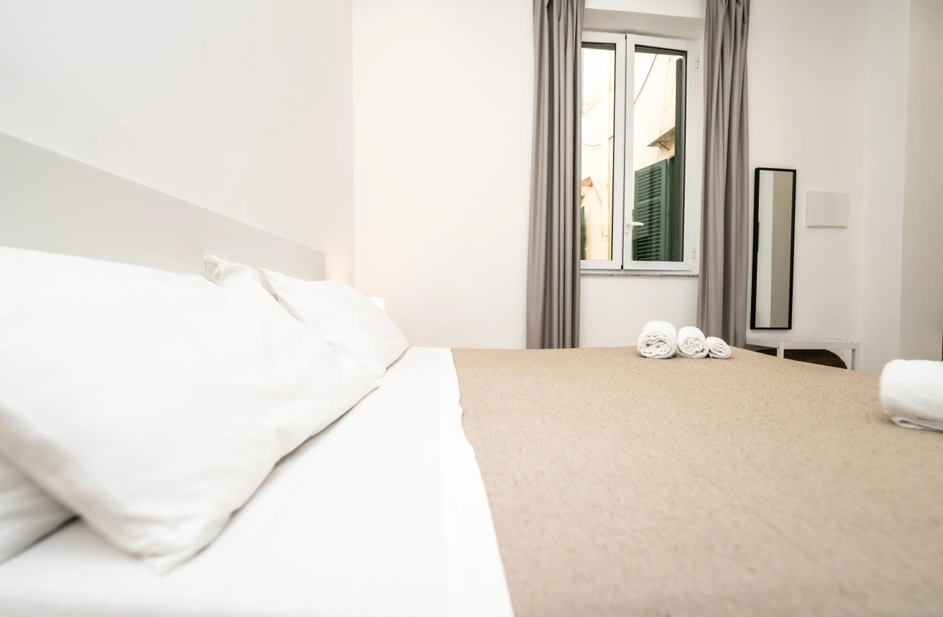 Bed in Valguarnera Studio Apartments
