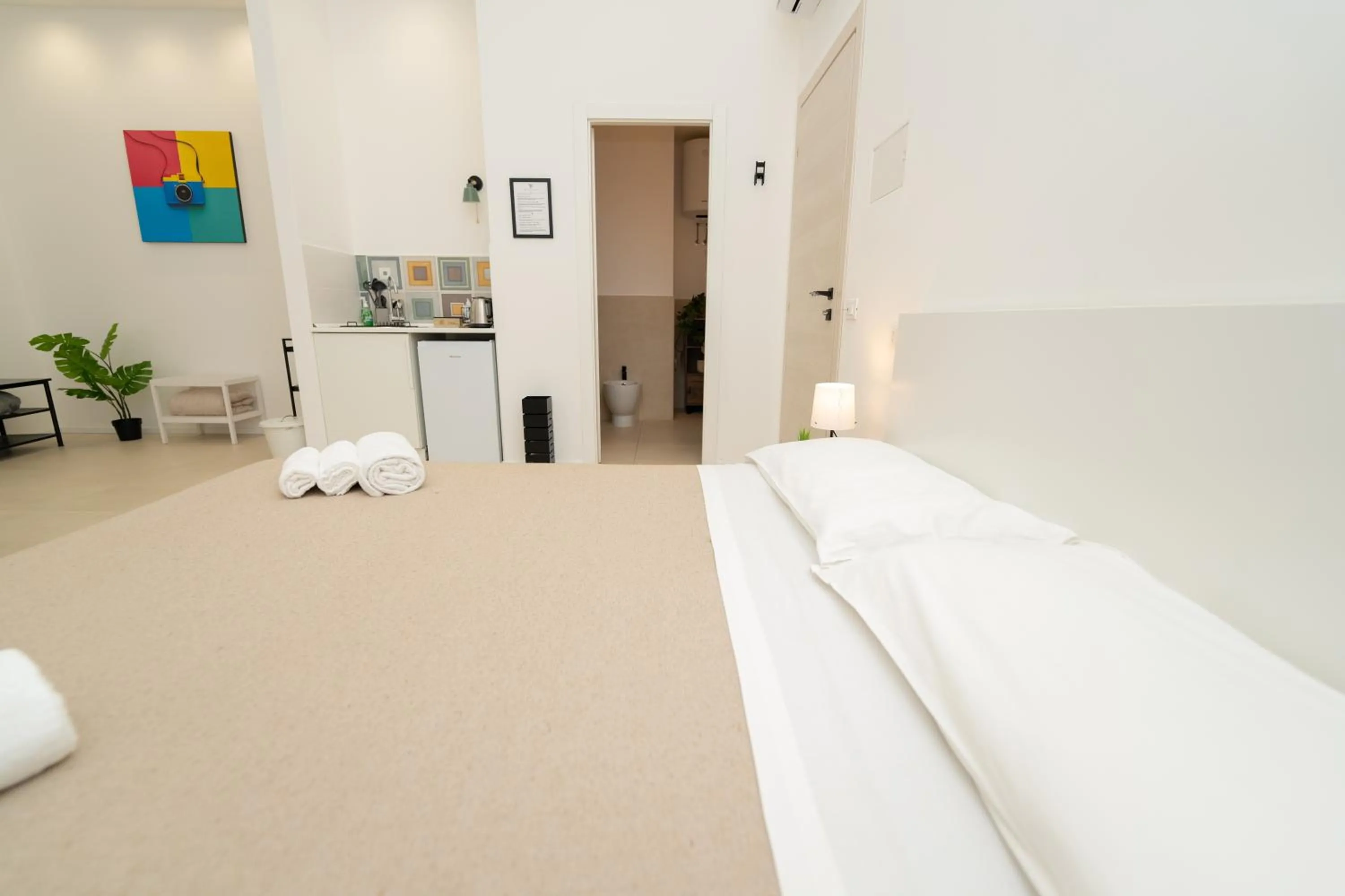 Bed in Valguarnera Studio Apartments
