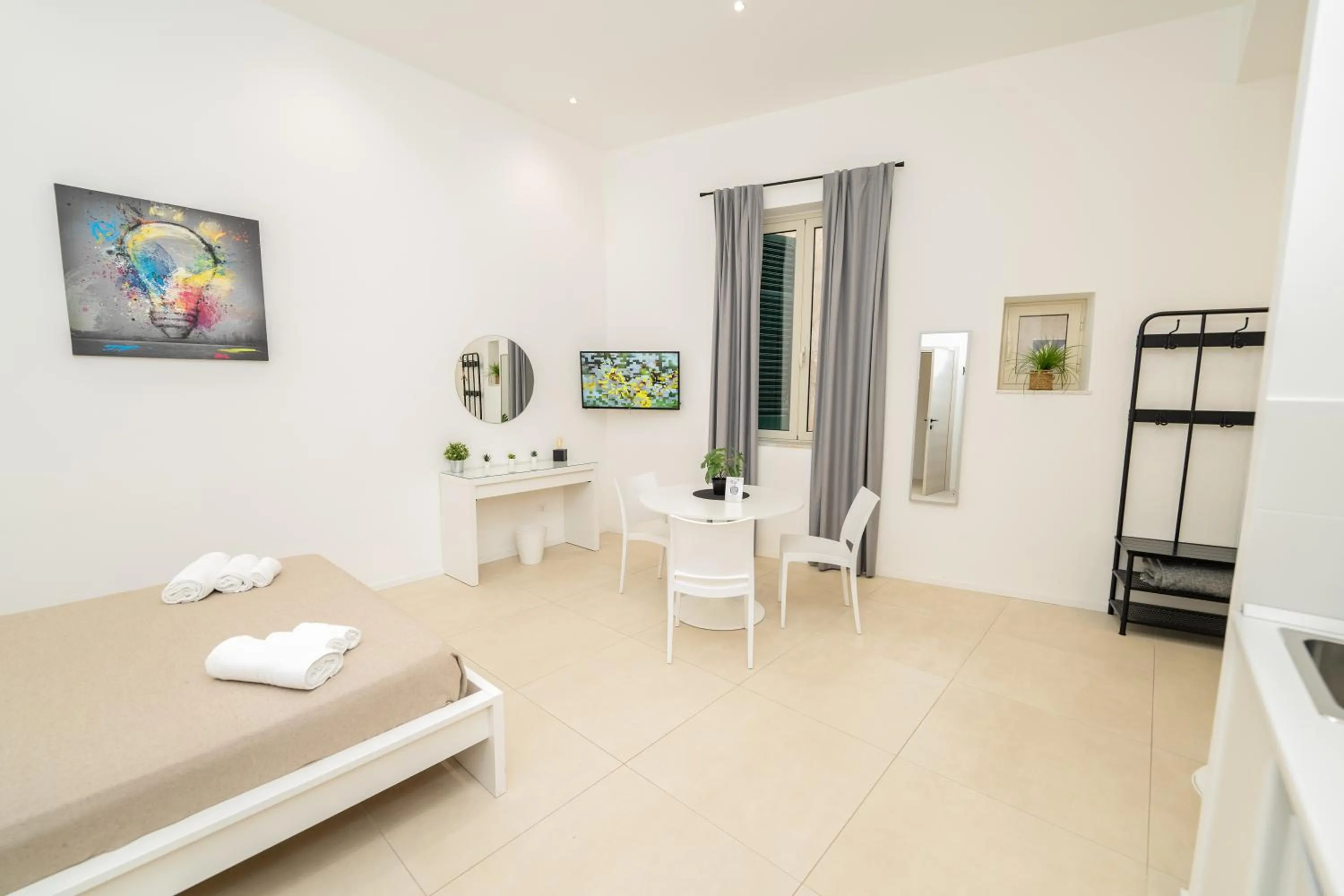 Bed in Valguarnera Studio Apartments