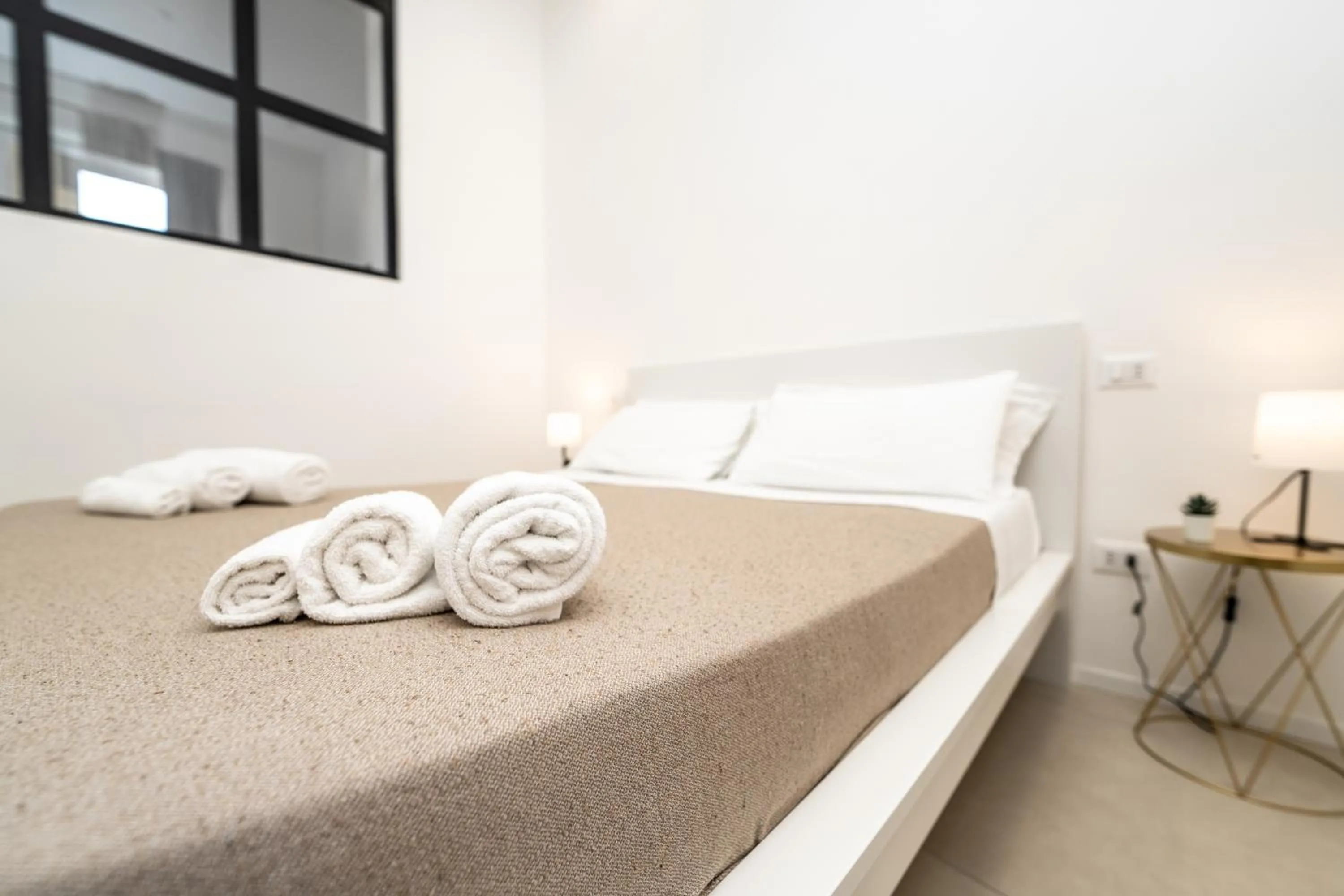 Bed in Valguarnera Studio Apartments