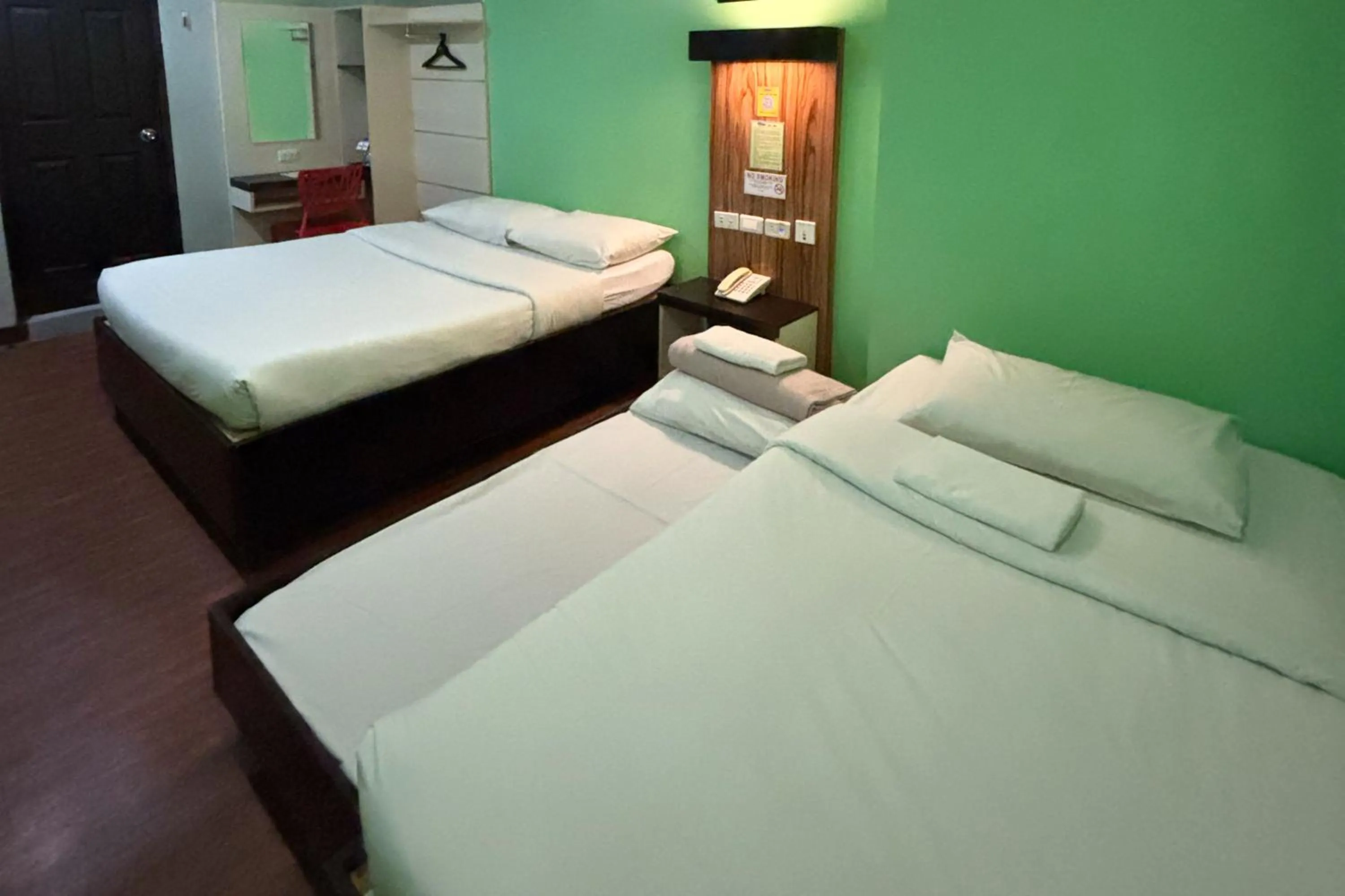 Bed in Sugbutel Family Hotel Cebu powered by Cocotel