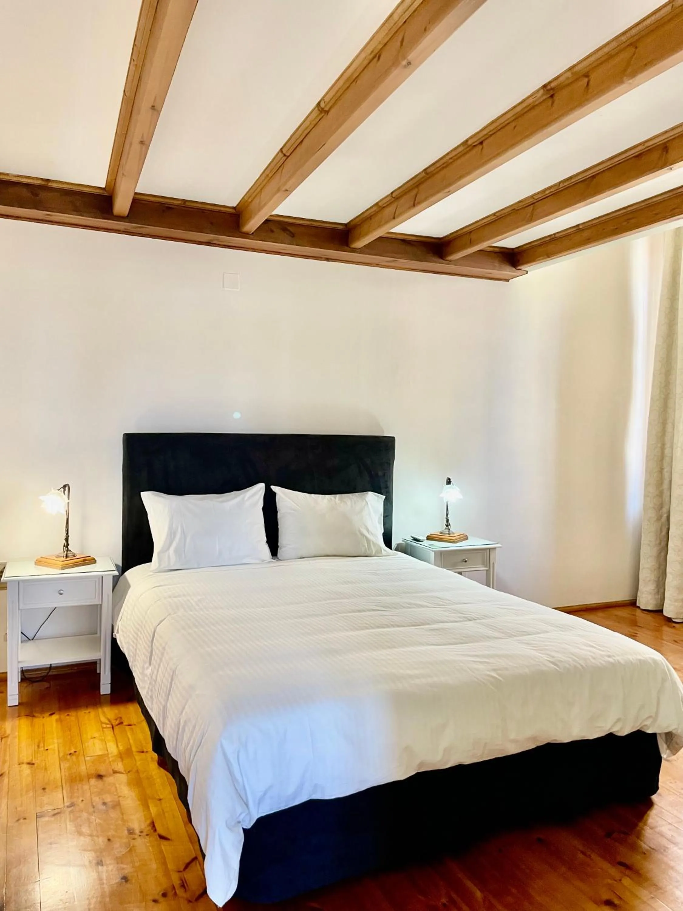 Bed in Erietta Suites