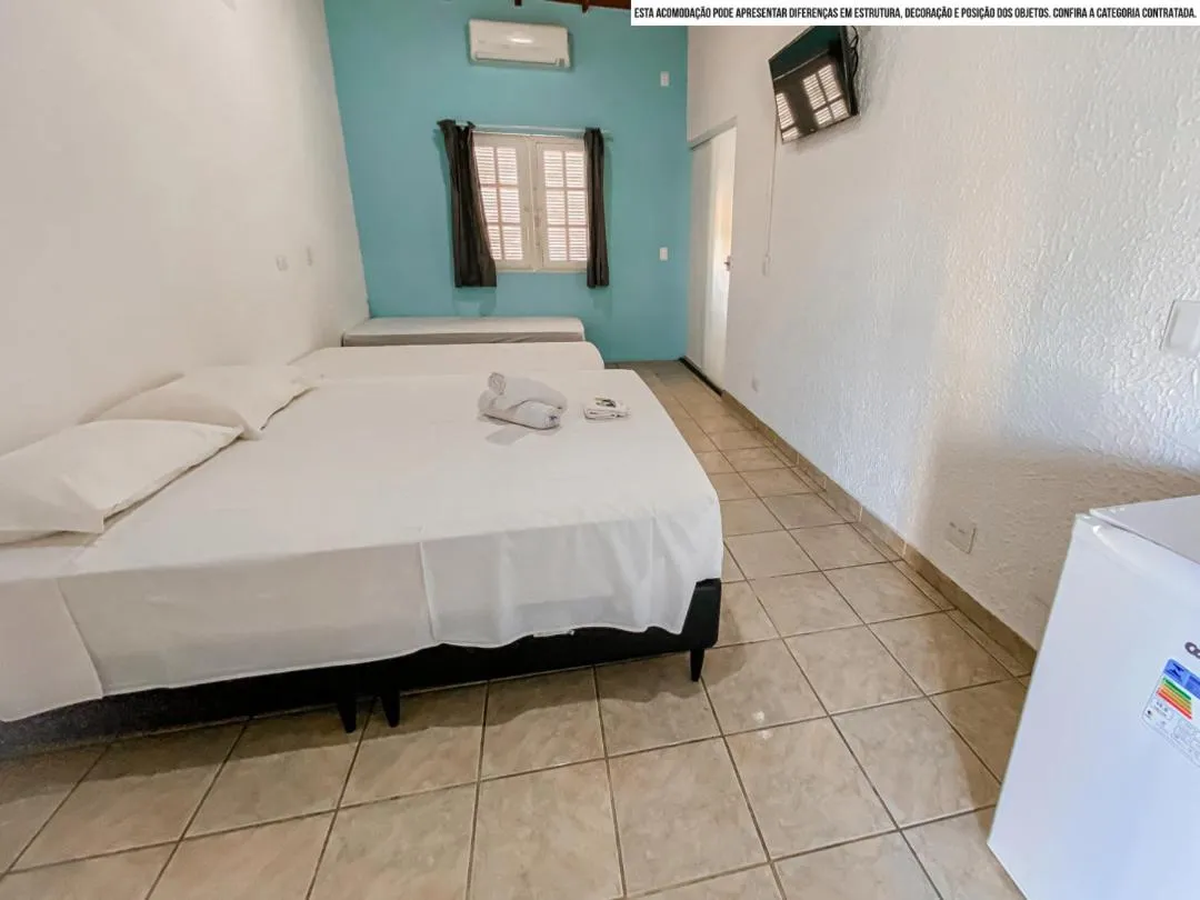 Bed in Pousada Riviera Caragua