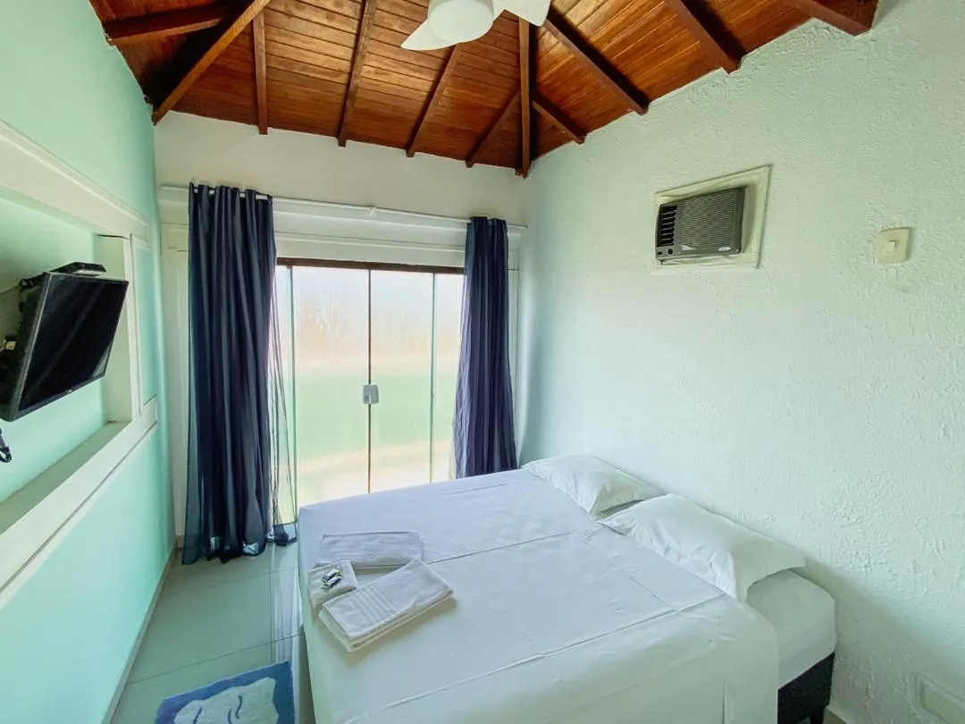 Bed in Pousada Riviera Caragua