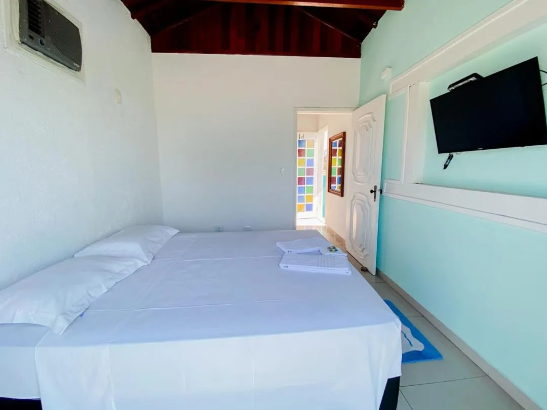 Bed in Pousada Riviera Caragua