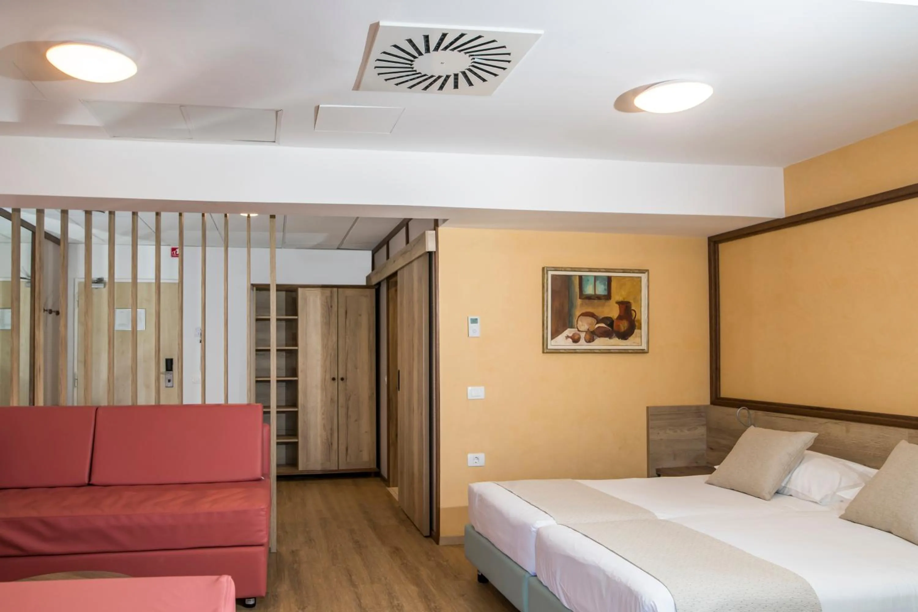 Bed in Hotel Delfin
