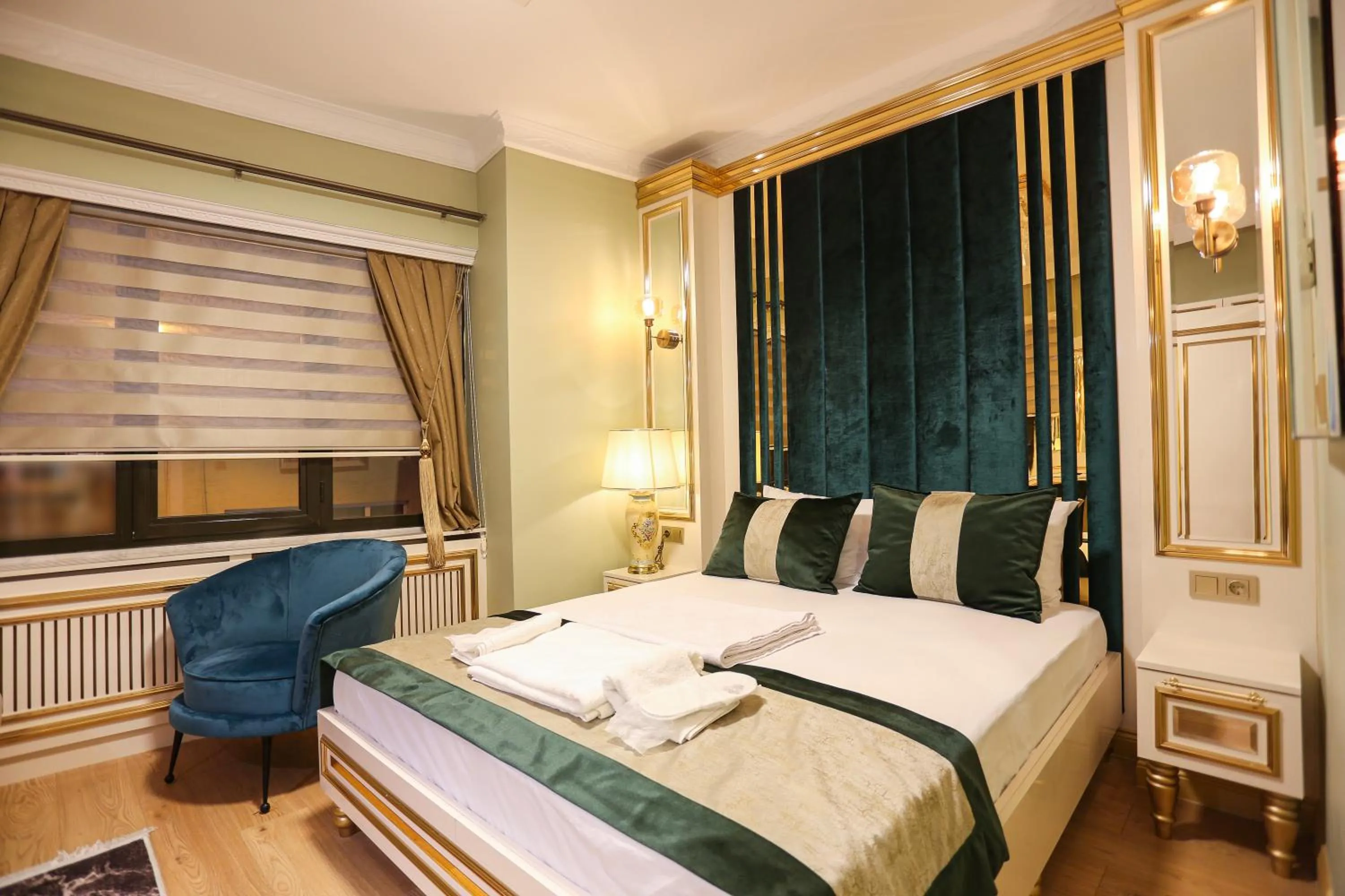 Bed in Whıte Moon Hotel Suites