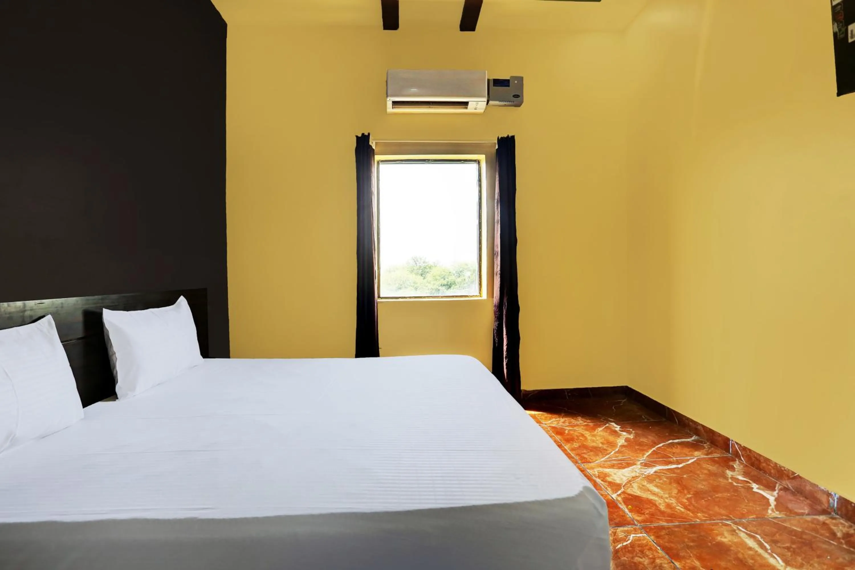 Bedroom in Hotel O Dada Hotel