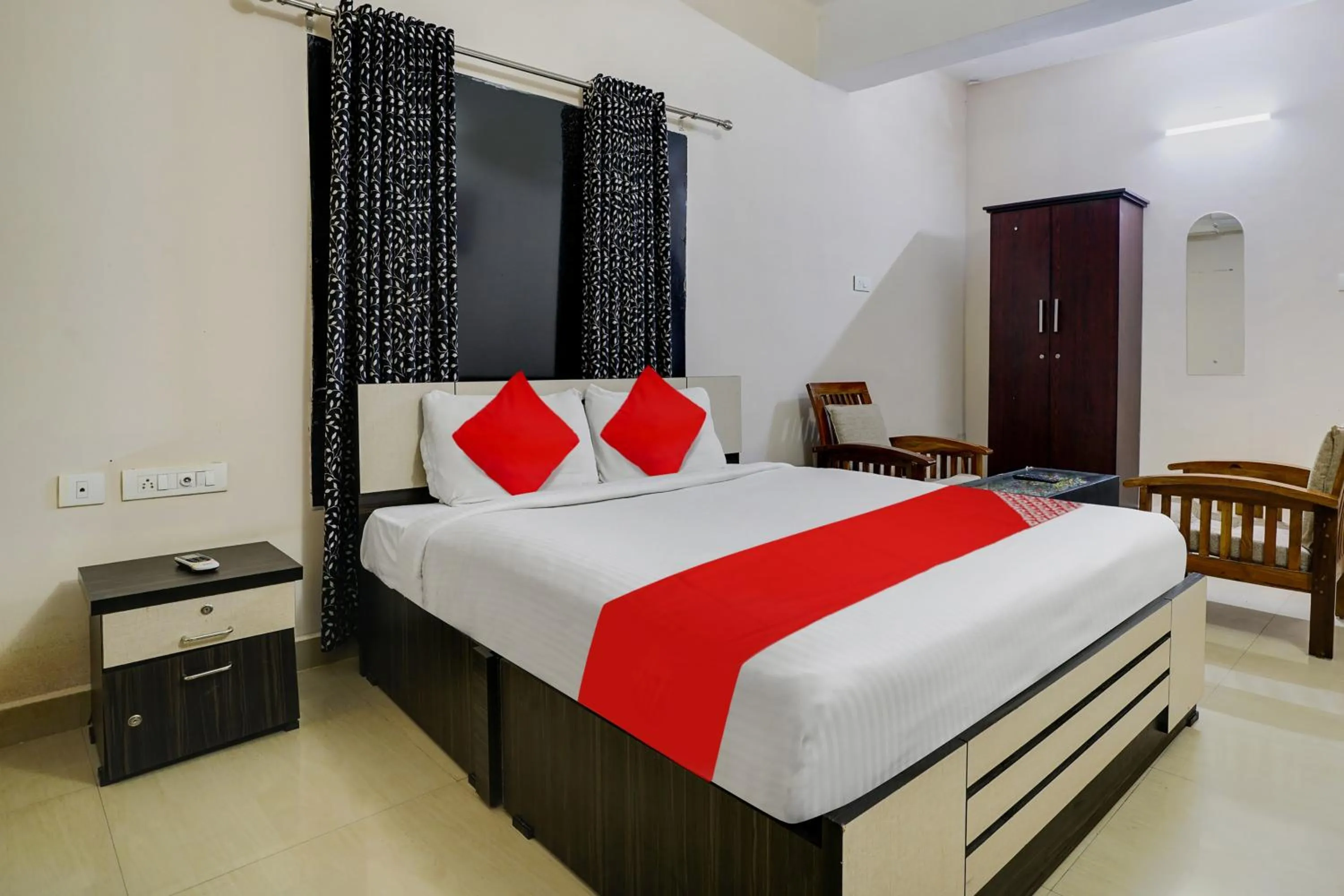 Bedroom in OYO Flagship Arrows Tourist Home