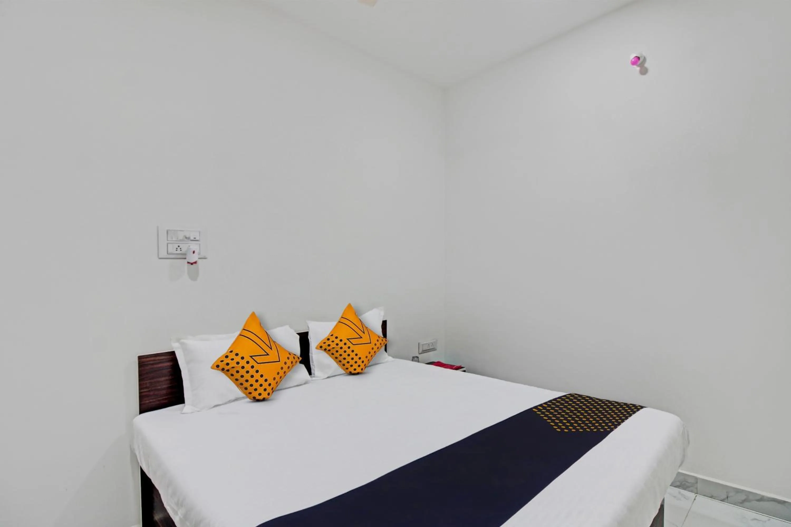 Bedroom in Spot On Tulsi Stay Inn