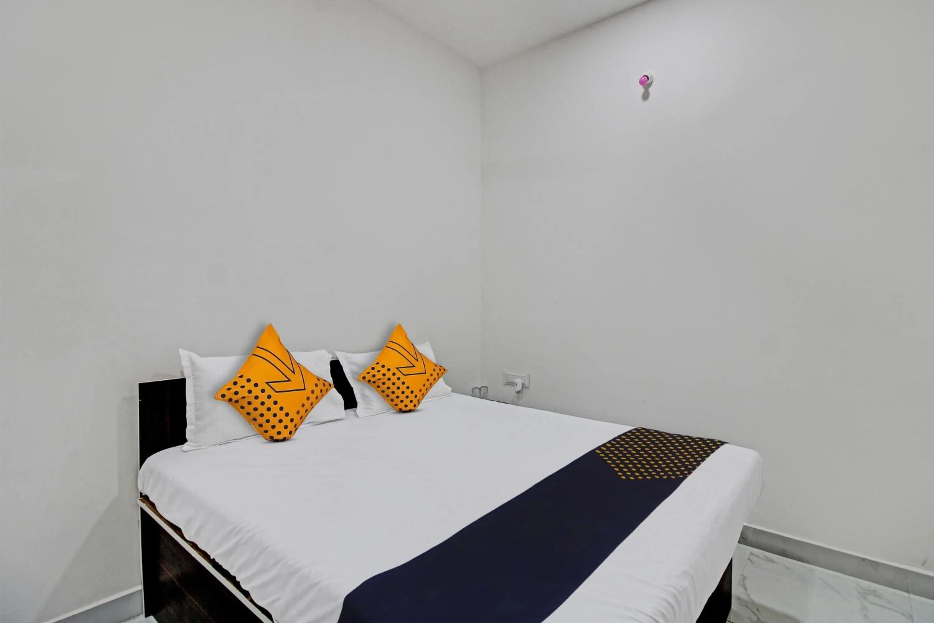 Bedroom in Spot On Tulsi Stay Inn