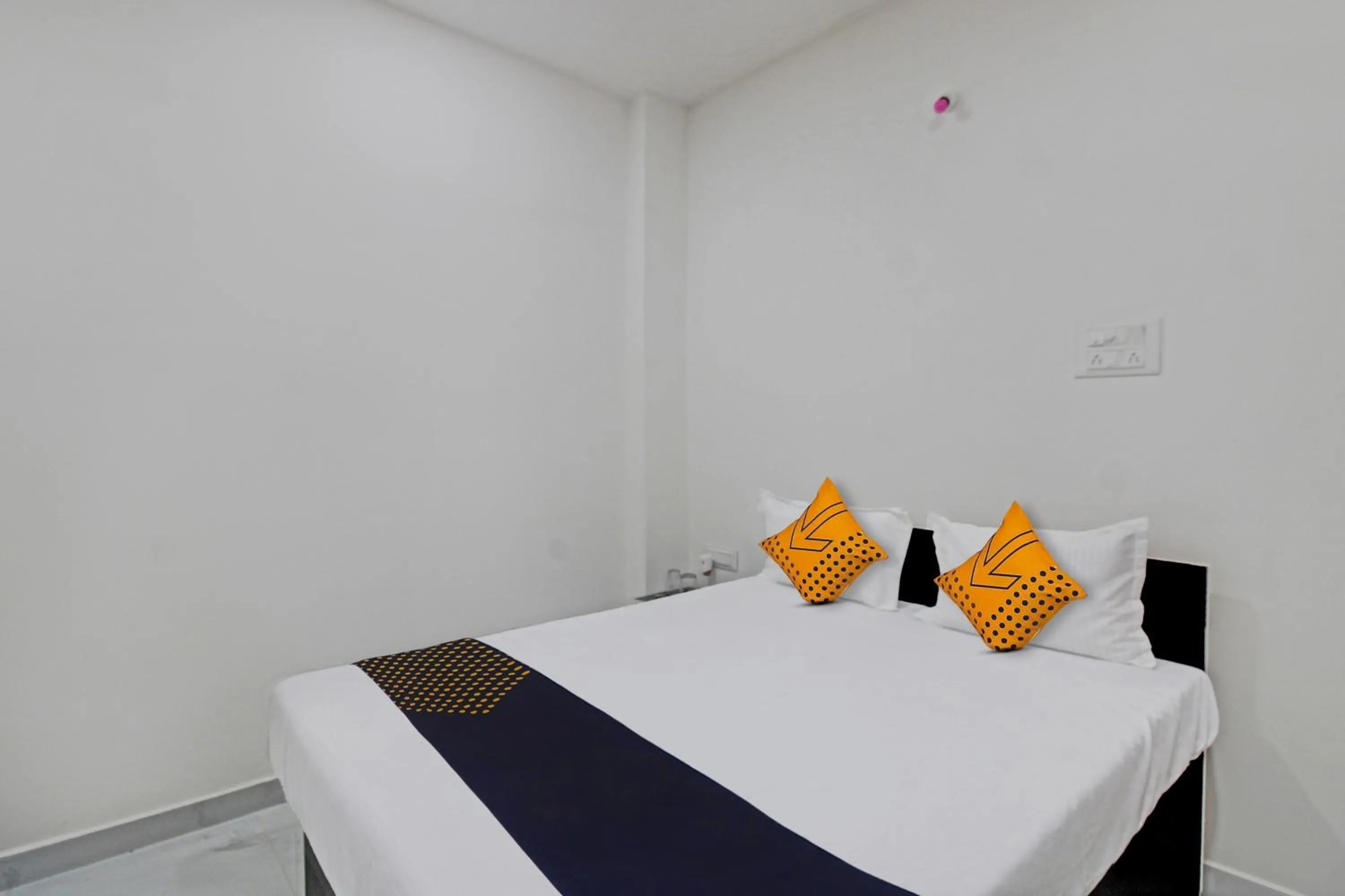 Bedroom in Spot On Tulsi Stay Inn