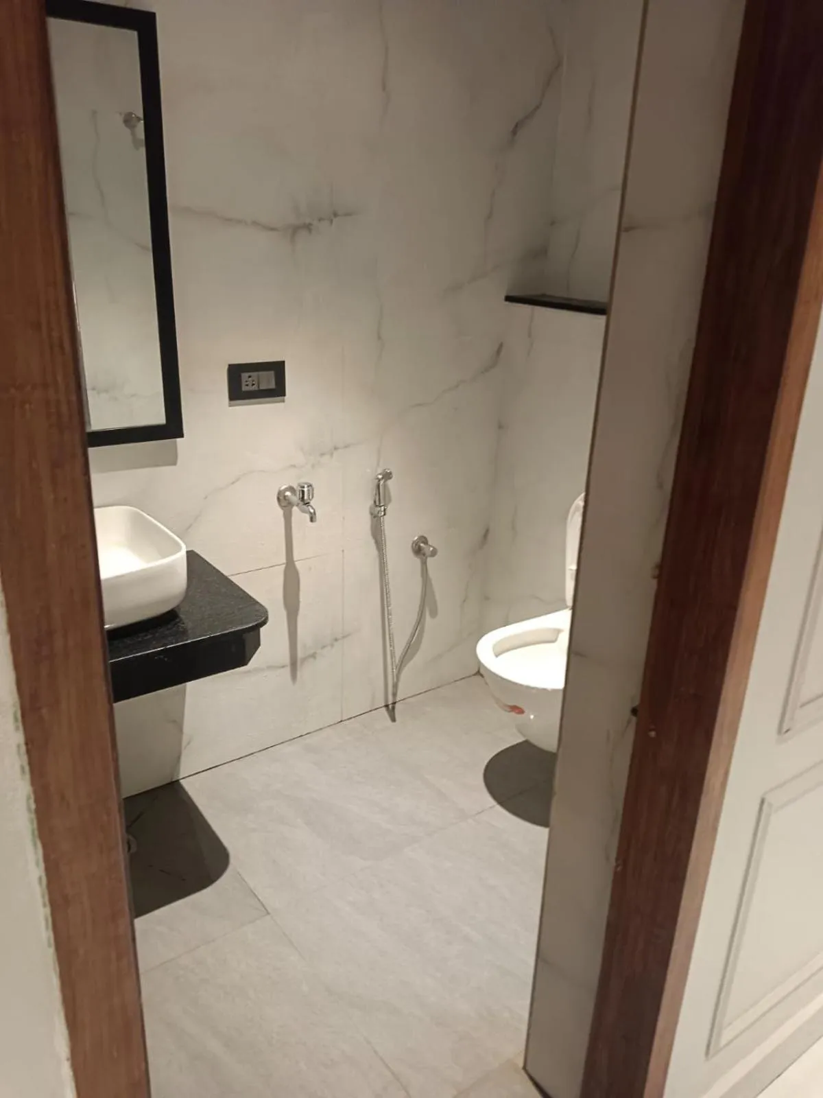 Bathroom in ARUNACHALA INN