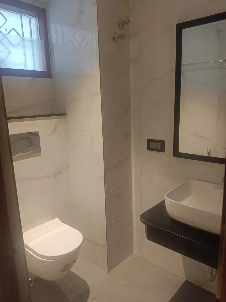 Toilet in ARUNACHALA INN