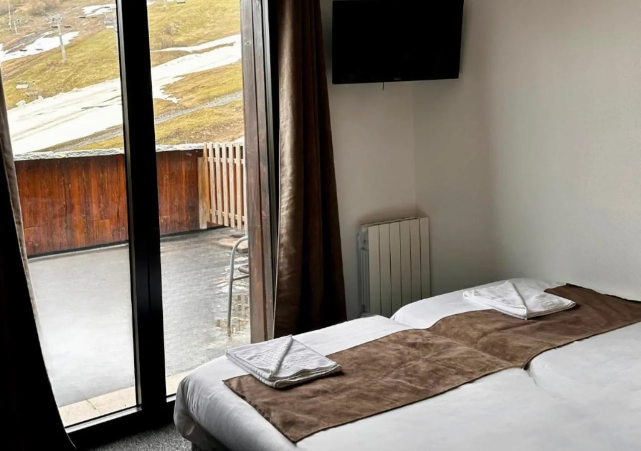 Balcony/Terrace, Bed in Hôtel & Spa Les Carrettes
