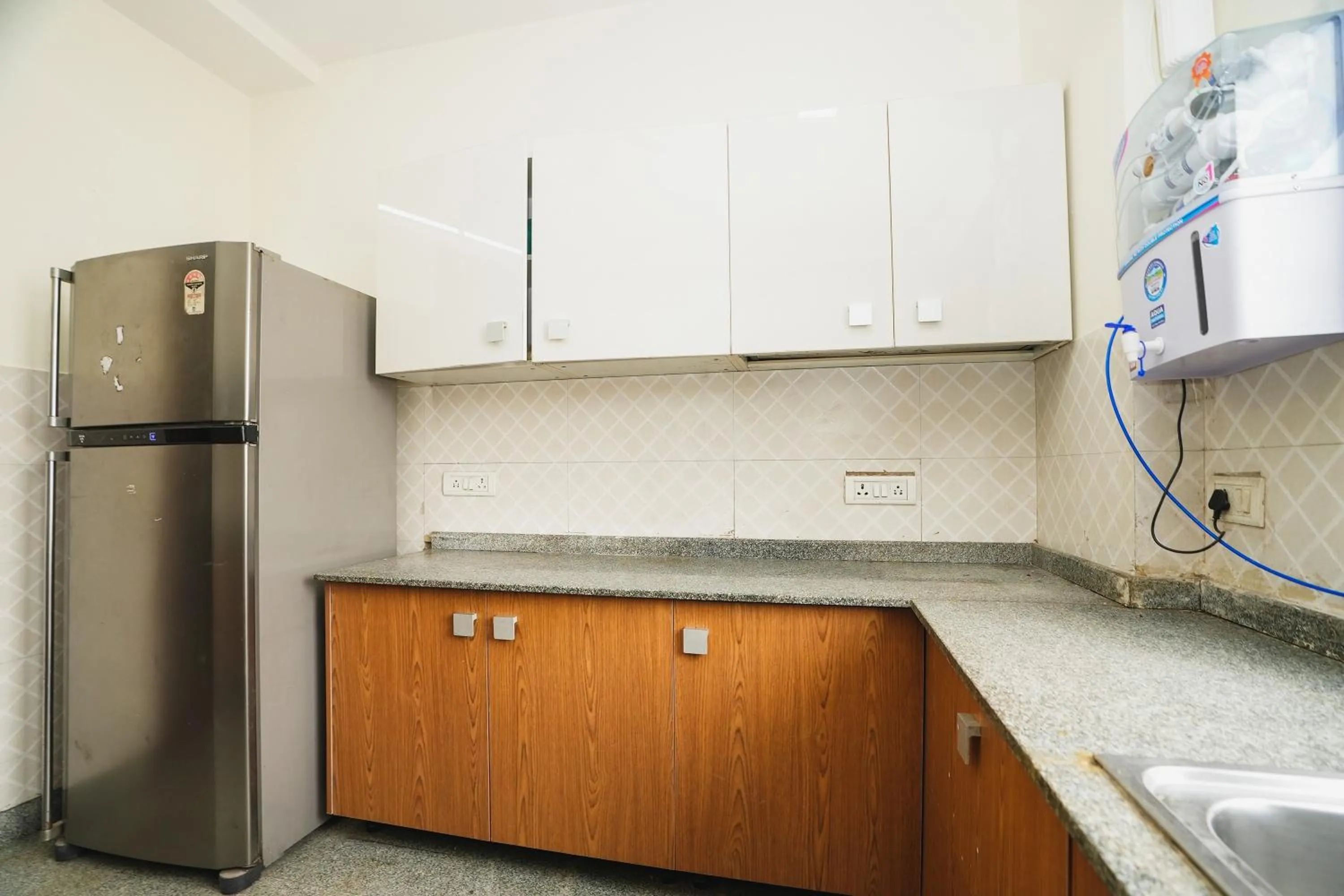 Kitchen or kitchenette in Mintstar Apartment and Suites, Chittaranjan Park