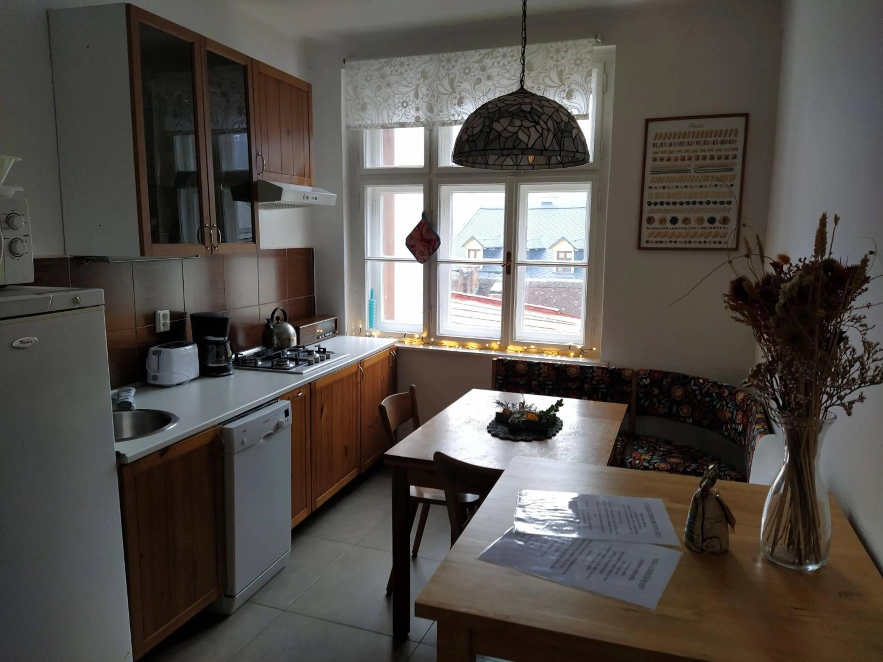 Kitchen or kitchenette in Apartmán u Mlsného medvěda