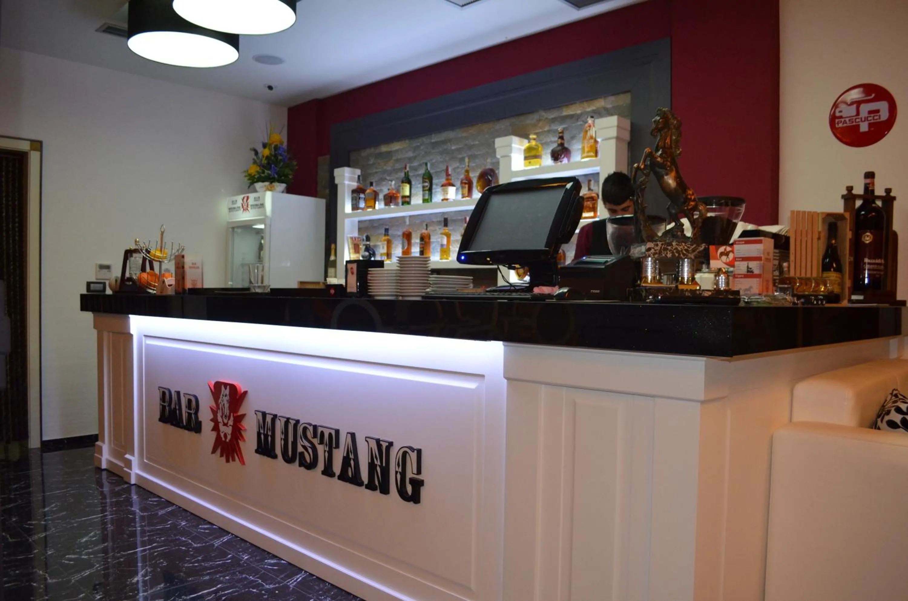 Property logo or sign in Hotel Mustang