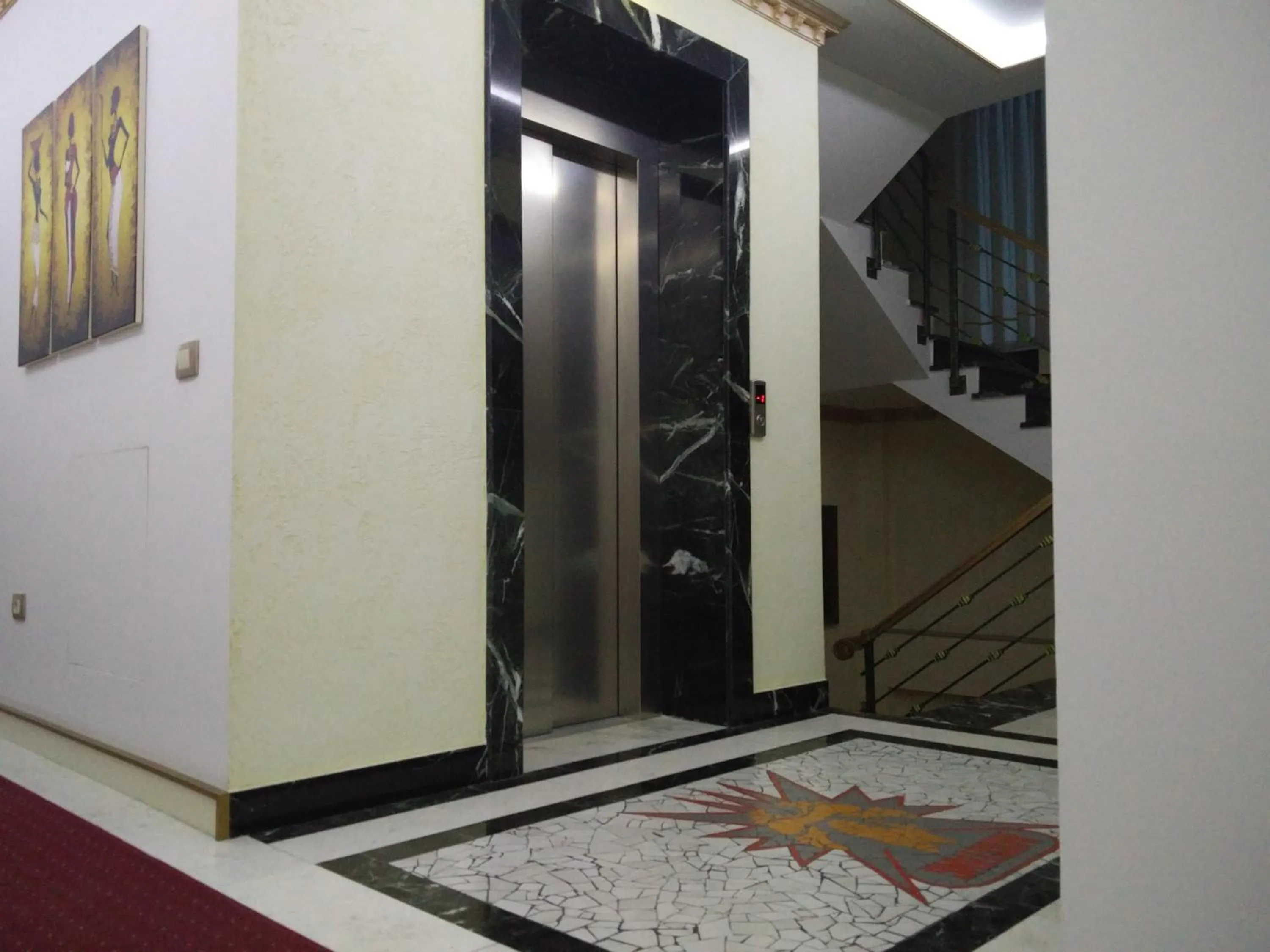 Property logo or sign in Hotel Mustang