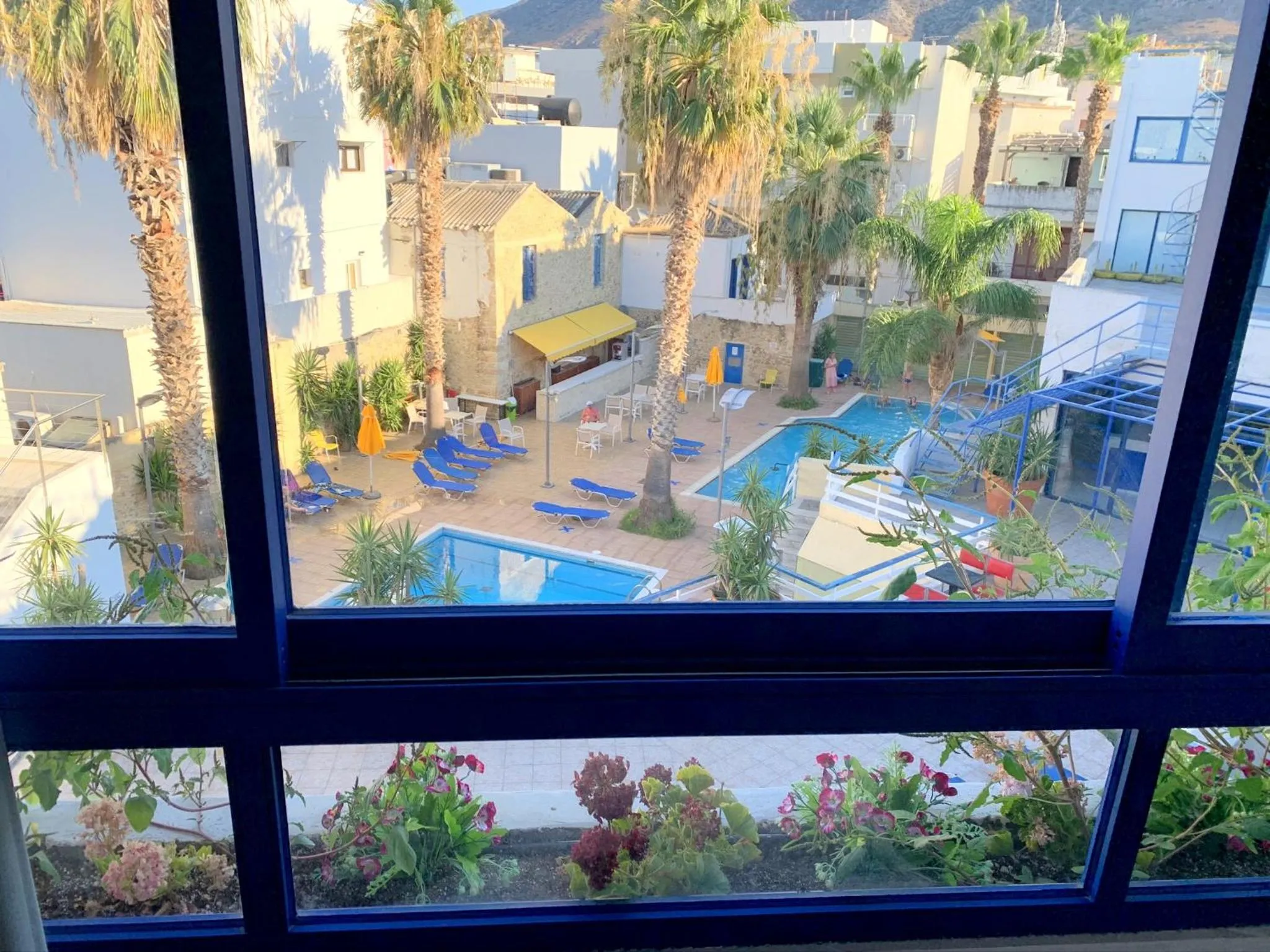 Swimming pool in Kassavetis Center - Hotel Studios & Apartments