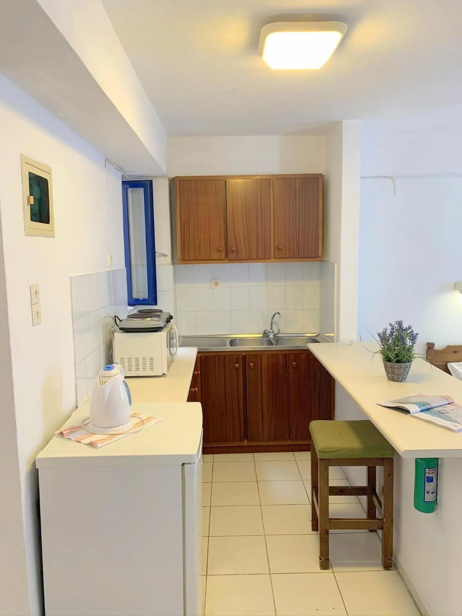 Kitchen or kitchenette in Kassavetis Center - Hotel Studios & Apartments