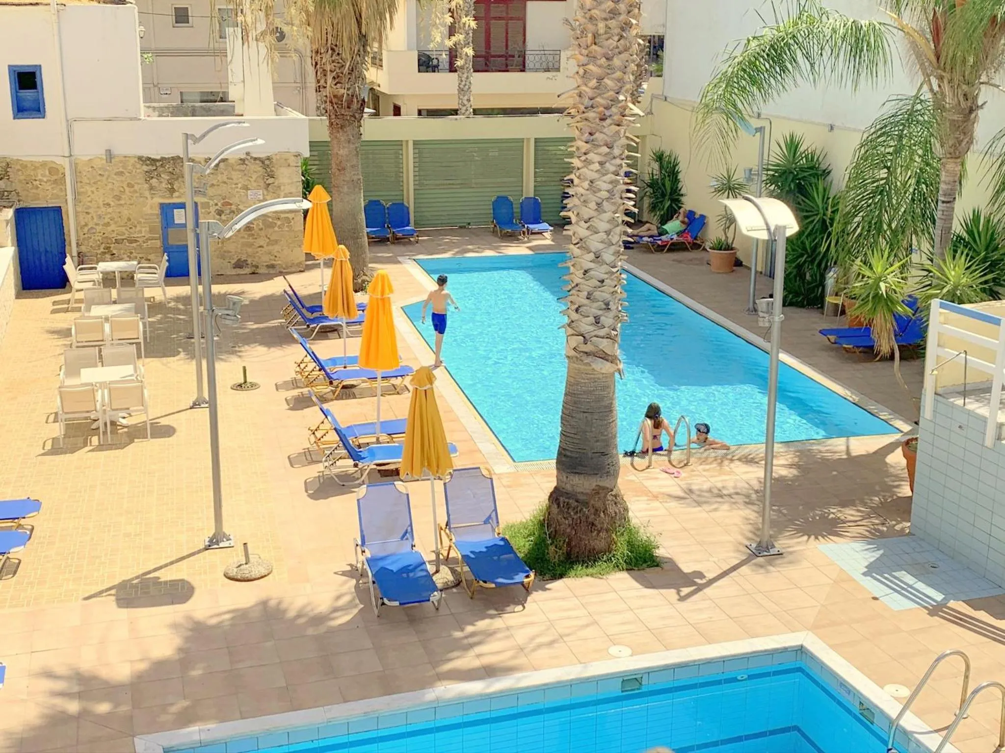 Swimming pool in Kassavetis Center - Hotel Studios & Apartments