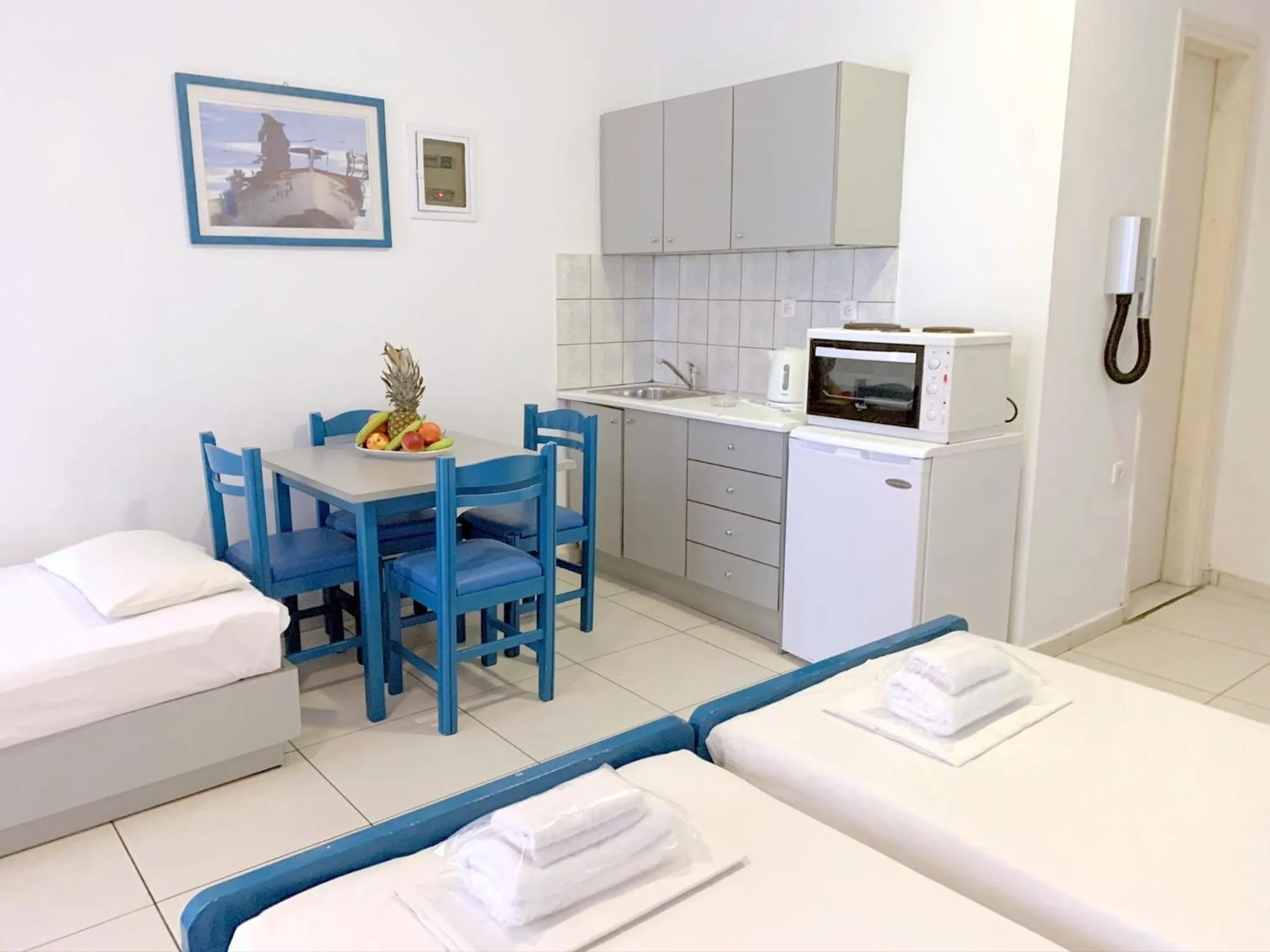 Bed in Kassavetis Center - Hotel Studios & Apartments