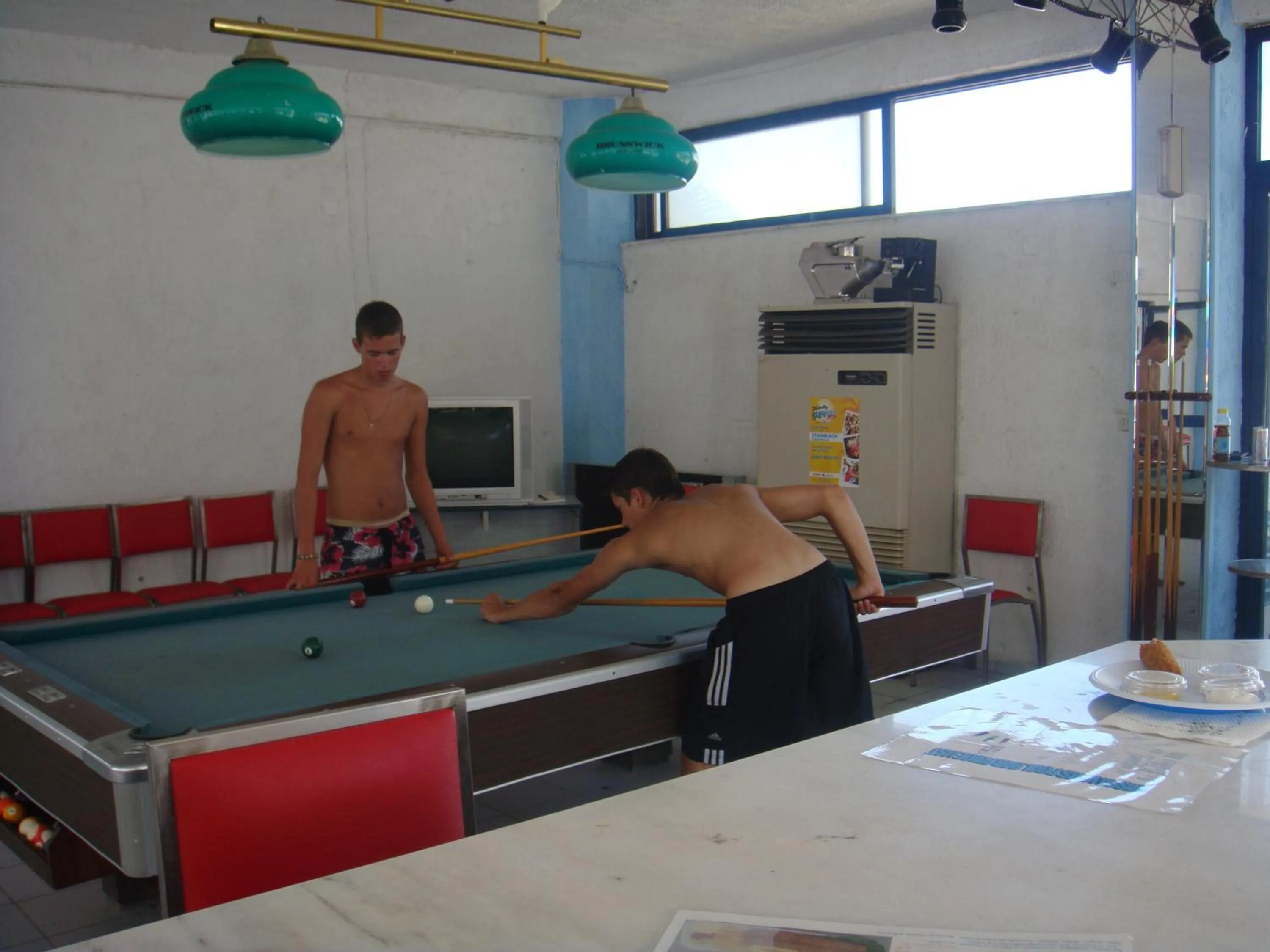 People in Kassavetis Center - Hotel Studios & Apartments