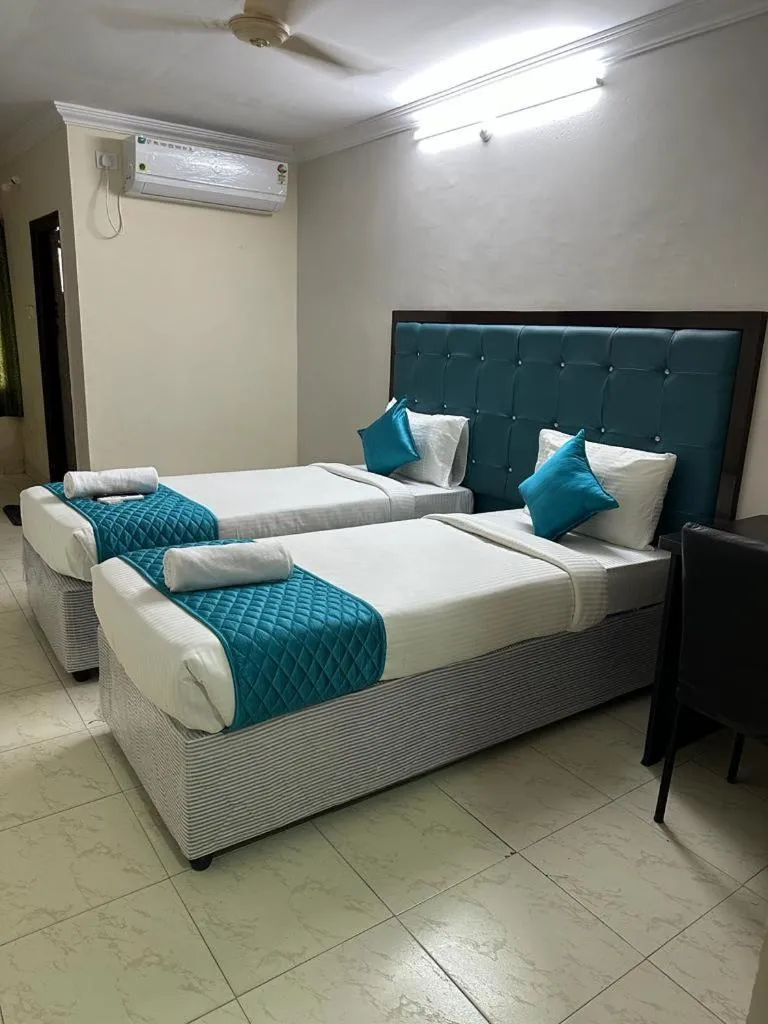 Bed in Hotel Skymoon Luxury Rooms