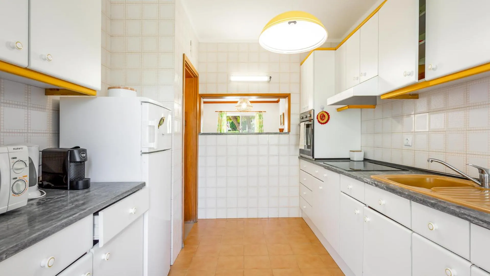 Kitchen or kitchenette in Casa Mia by LovelyStay