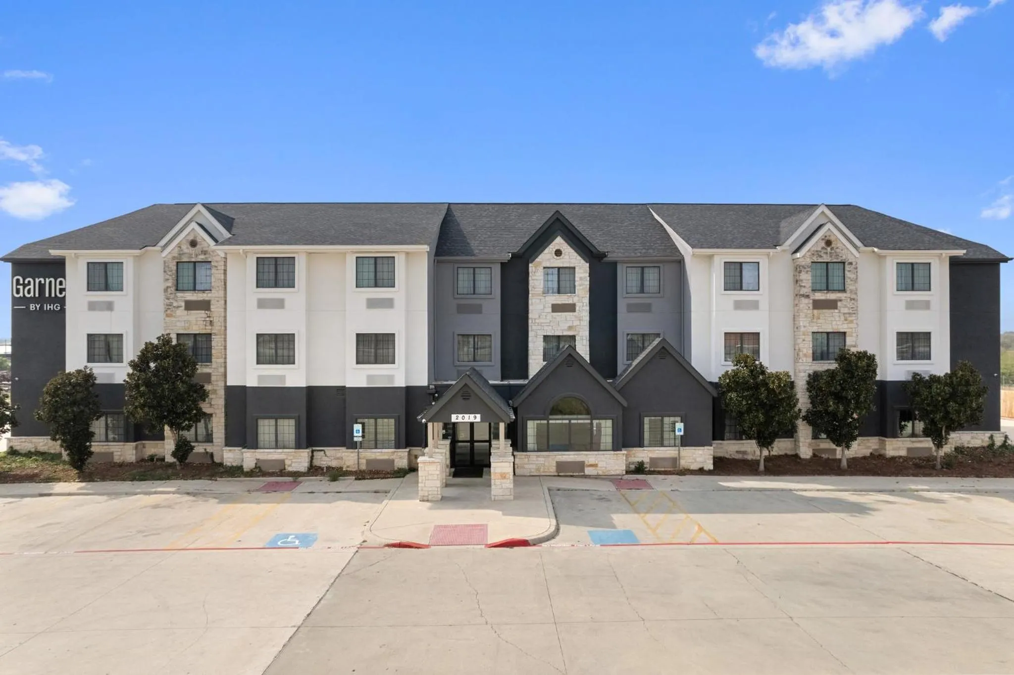 Property building in Garner Hotel Gonzales by IHG