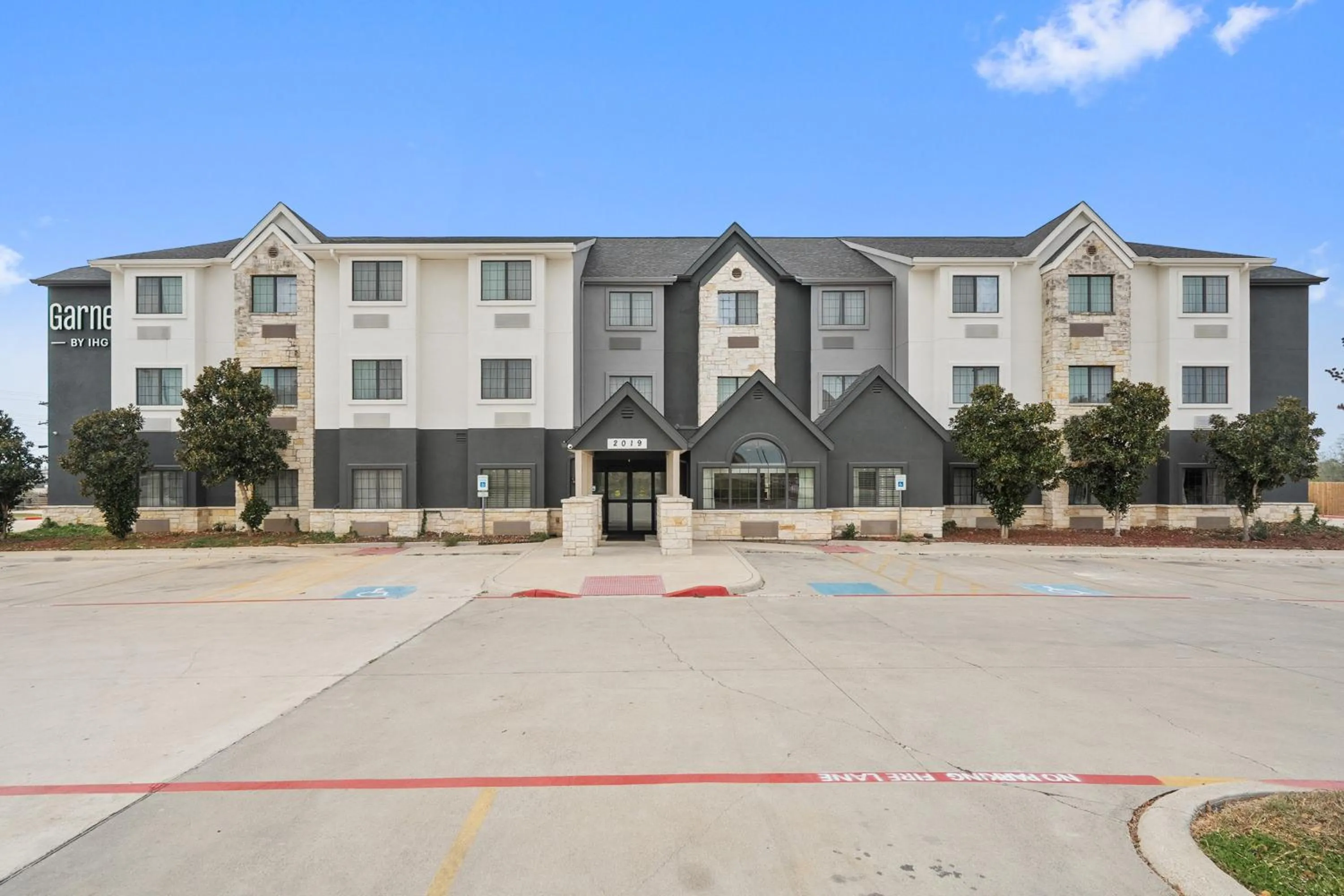 Property building in Garner Hotel Gonzales by IHG