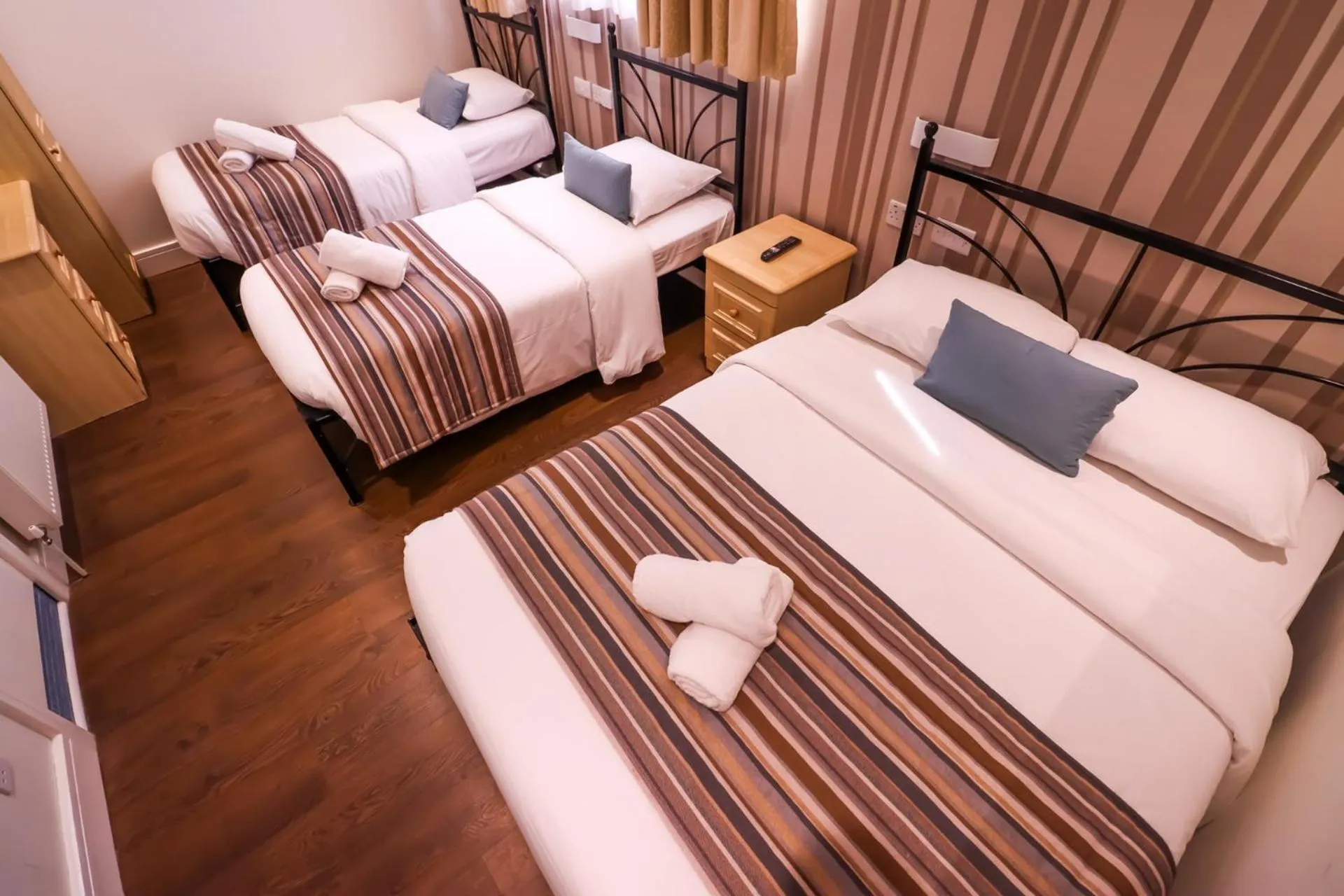 Bed in Fairway Hotel