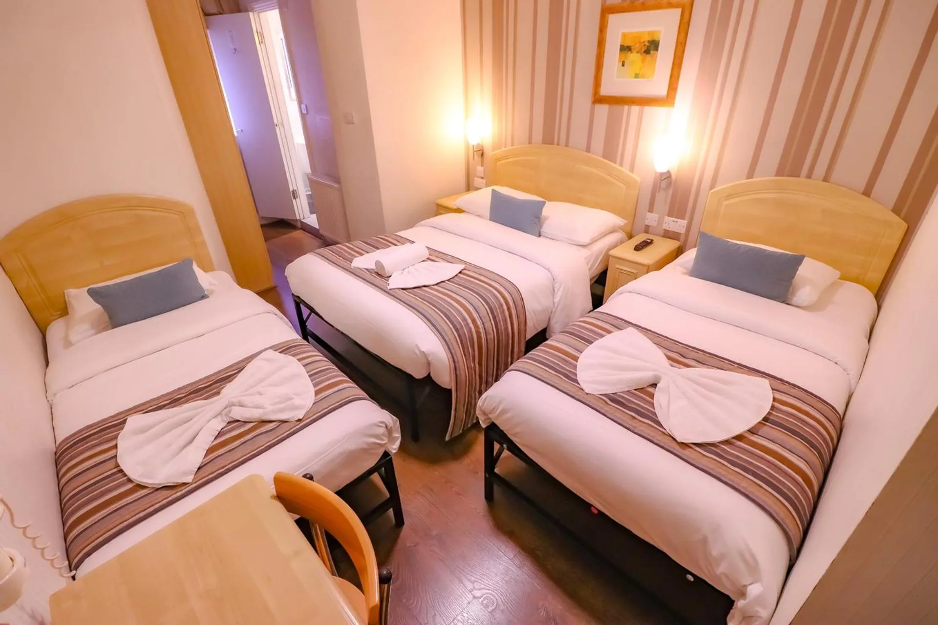 Bed in Fairway Hotel