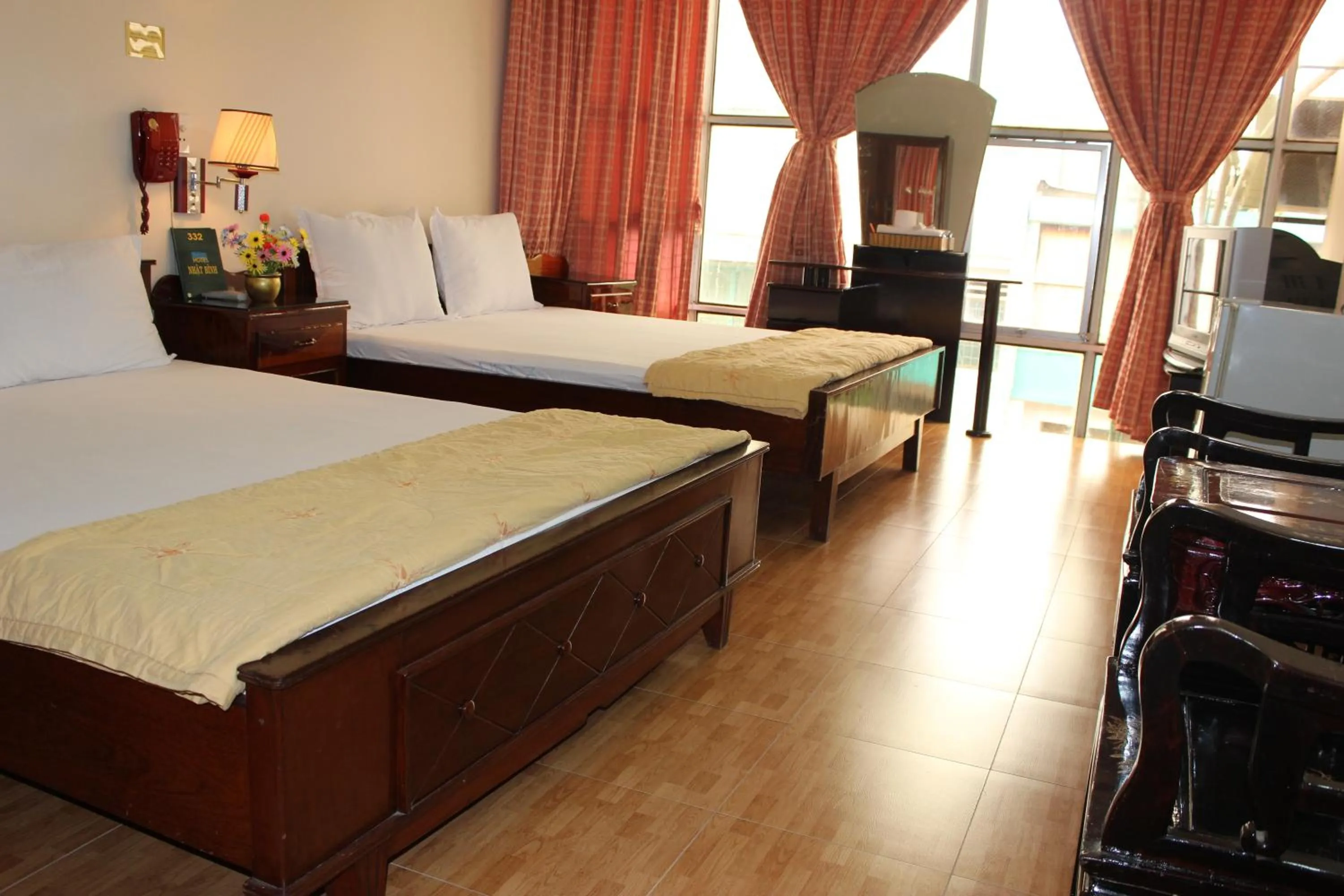 Photo of the whole room, Bed in Nhat Binh Hotel