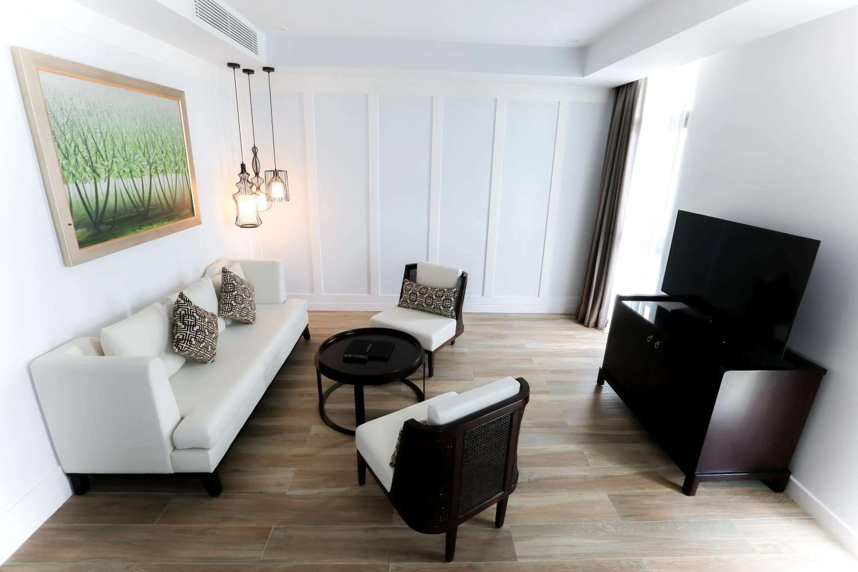 Communal lounge/ TV room in Montgomerie Links Hotel & Villas