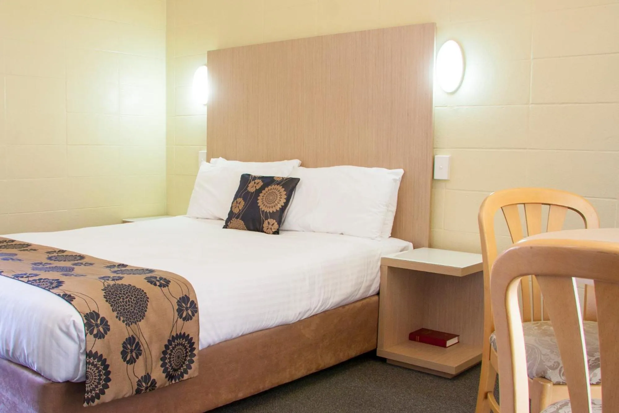 Bed in Coffs Windmill Motel