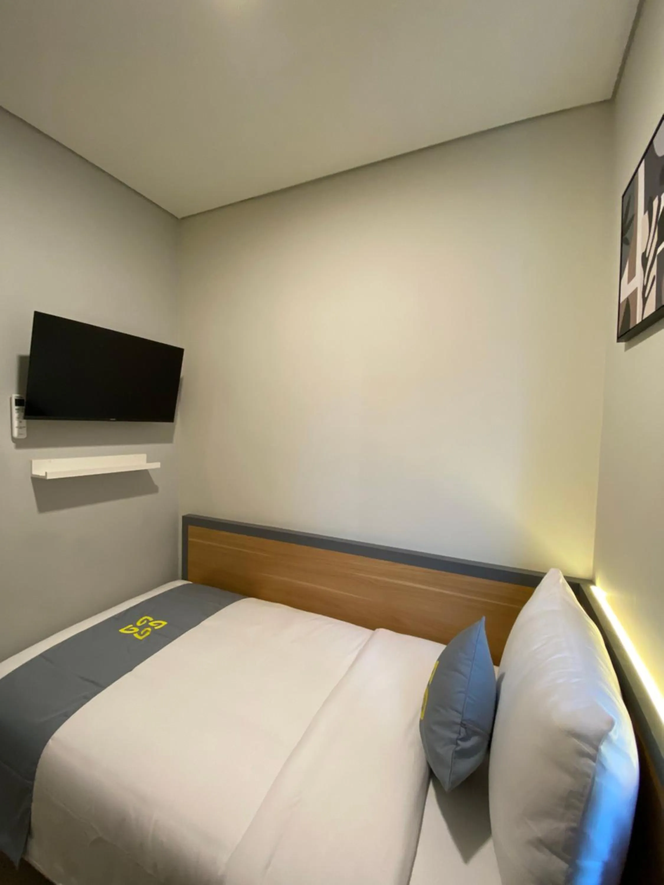 Bed in Ghurfati Hotel Wedana