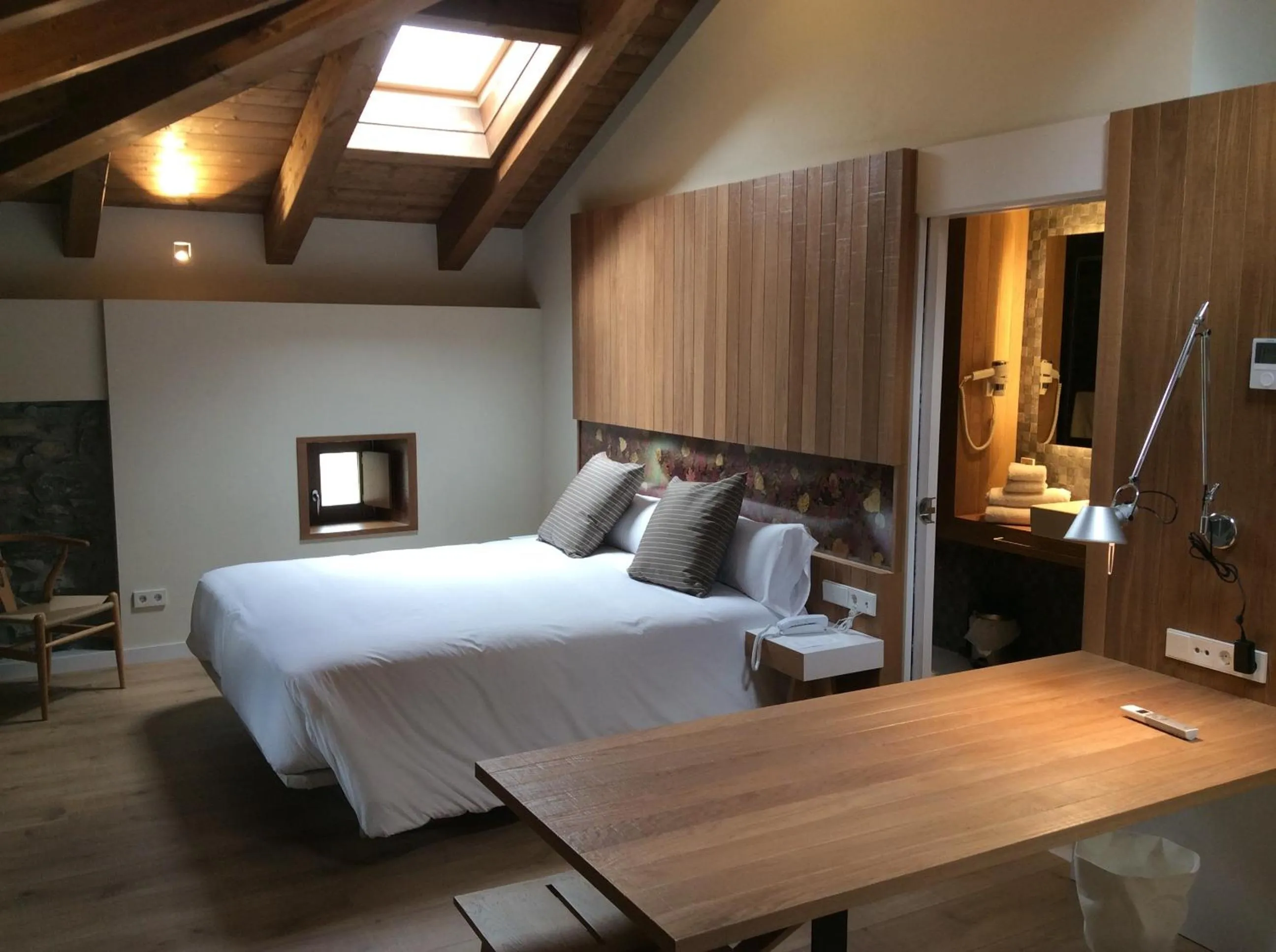 Photo of the whole room, Bed in Palacio de Yrisarri by IrriSarri Land