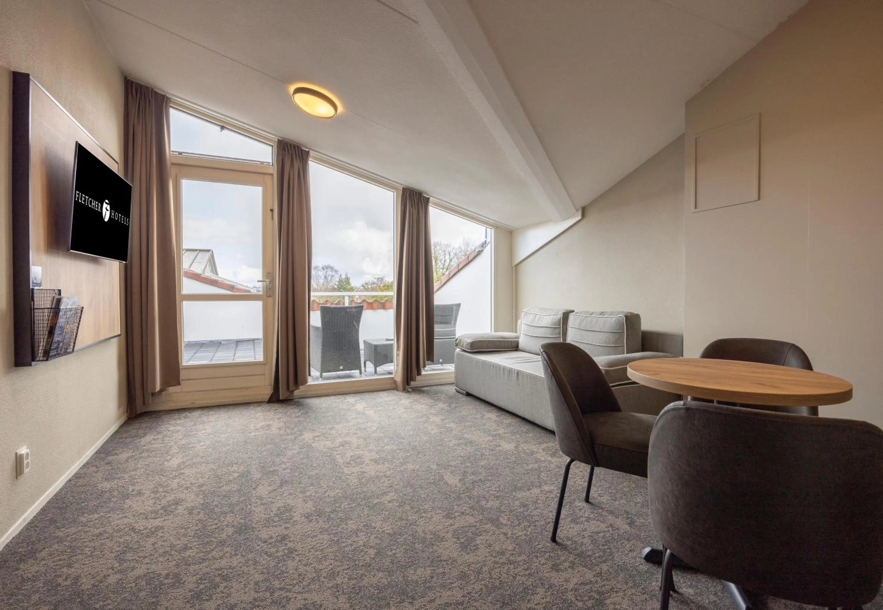 Living room in Fletcher Hotel Jan van Scorel