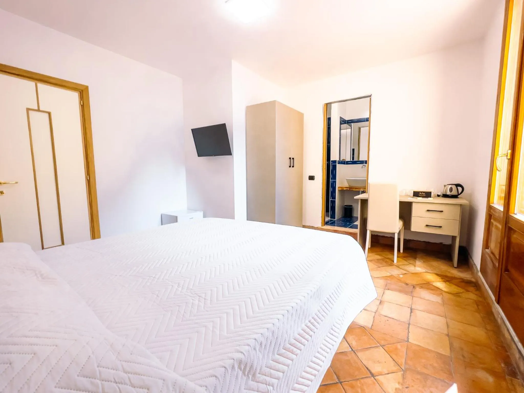 Photo of the whole room, Bed in Residenza Ester